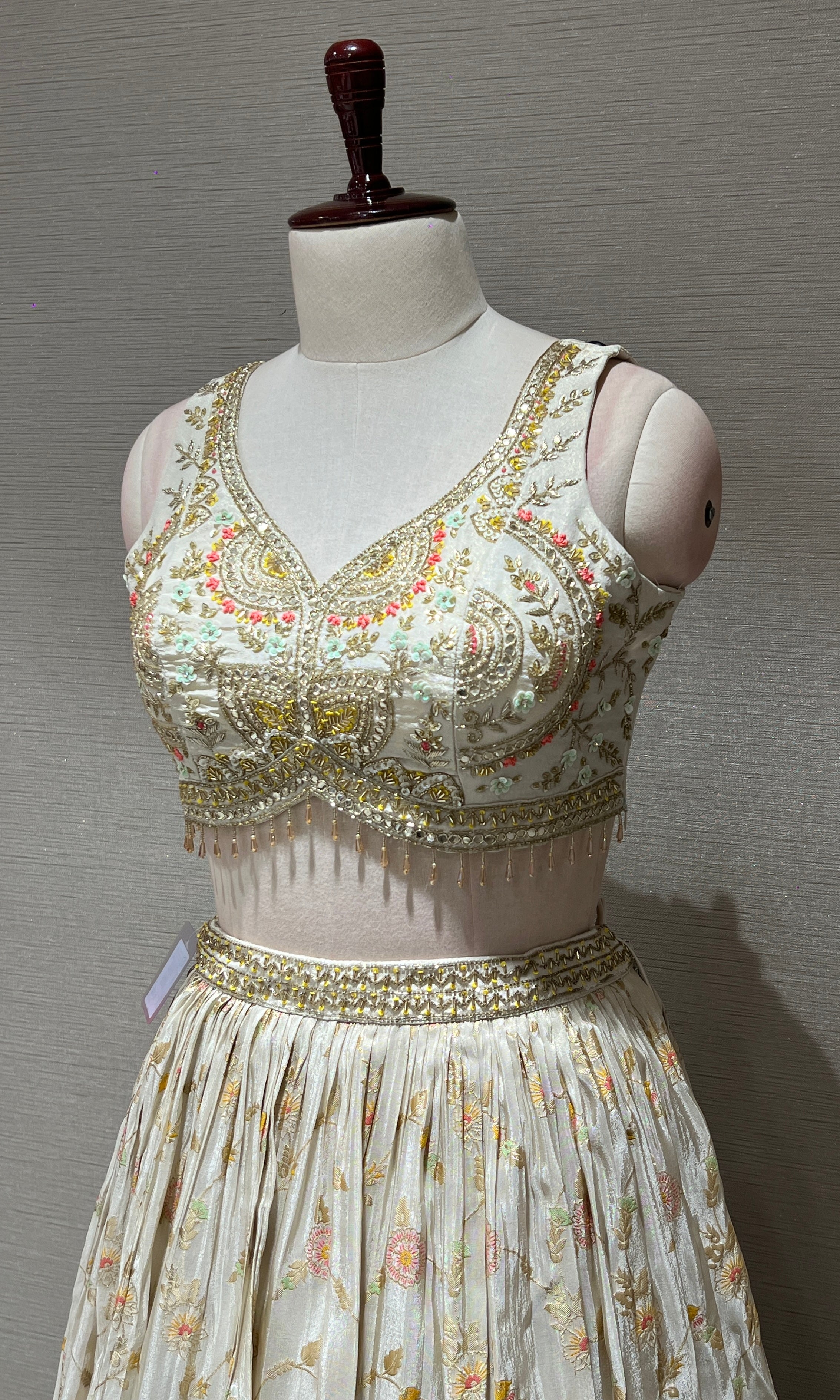 Half white Floral embroidred Lehenga with Golden Border