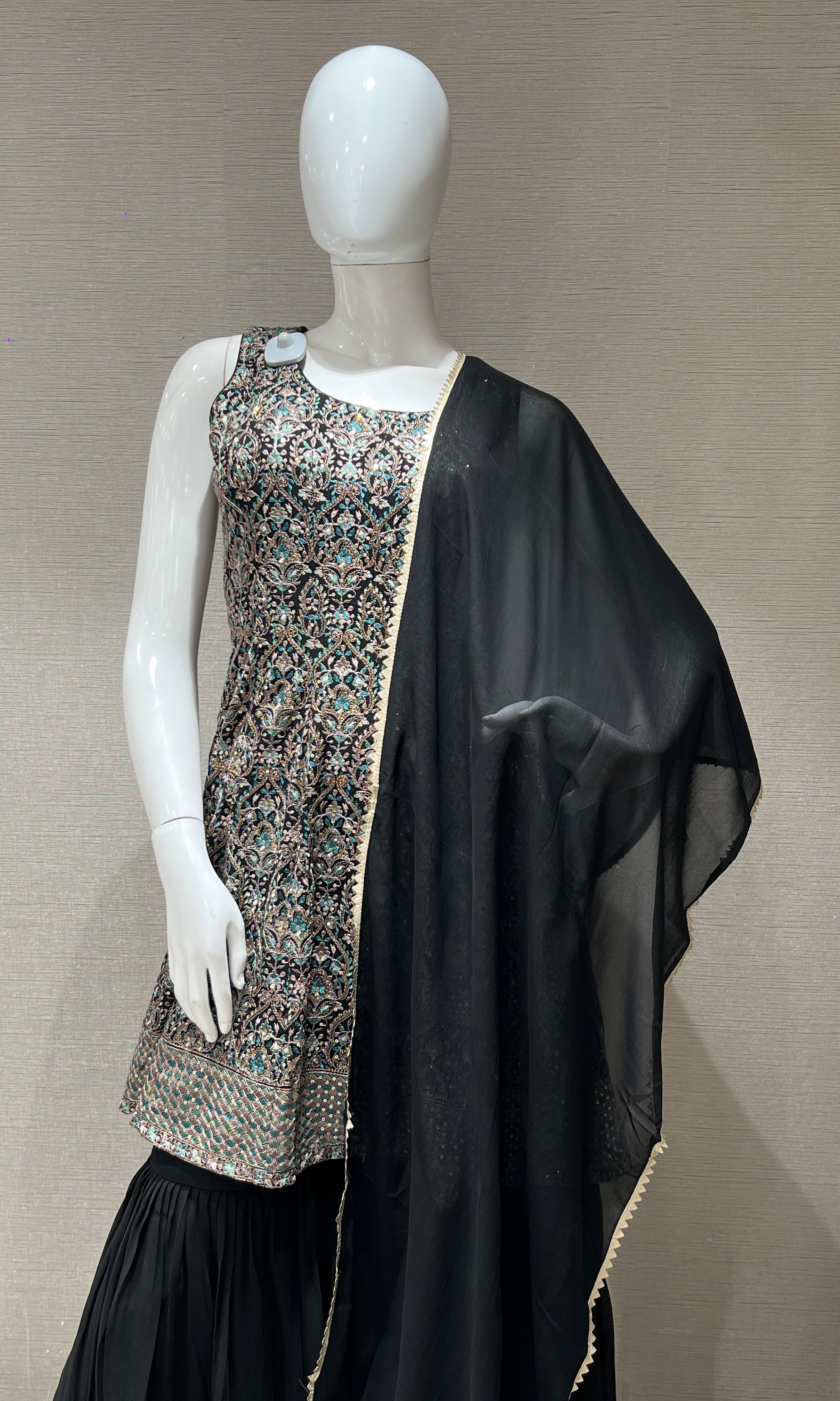 Black sharara with gold embroidery peplum top