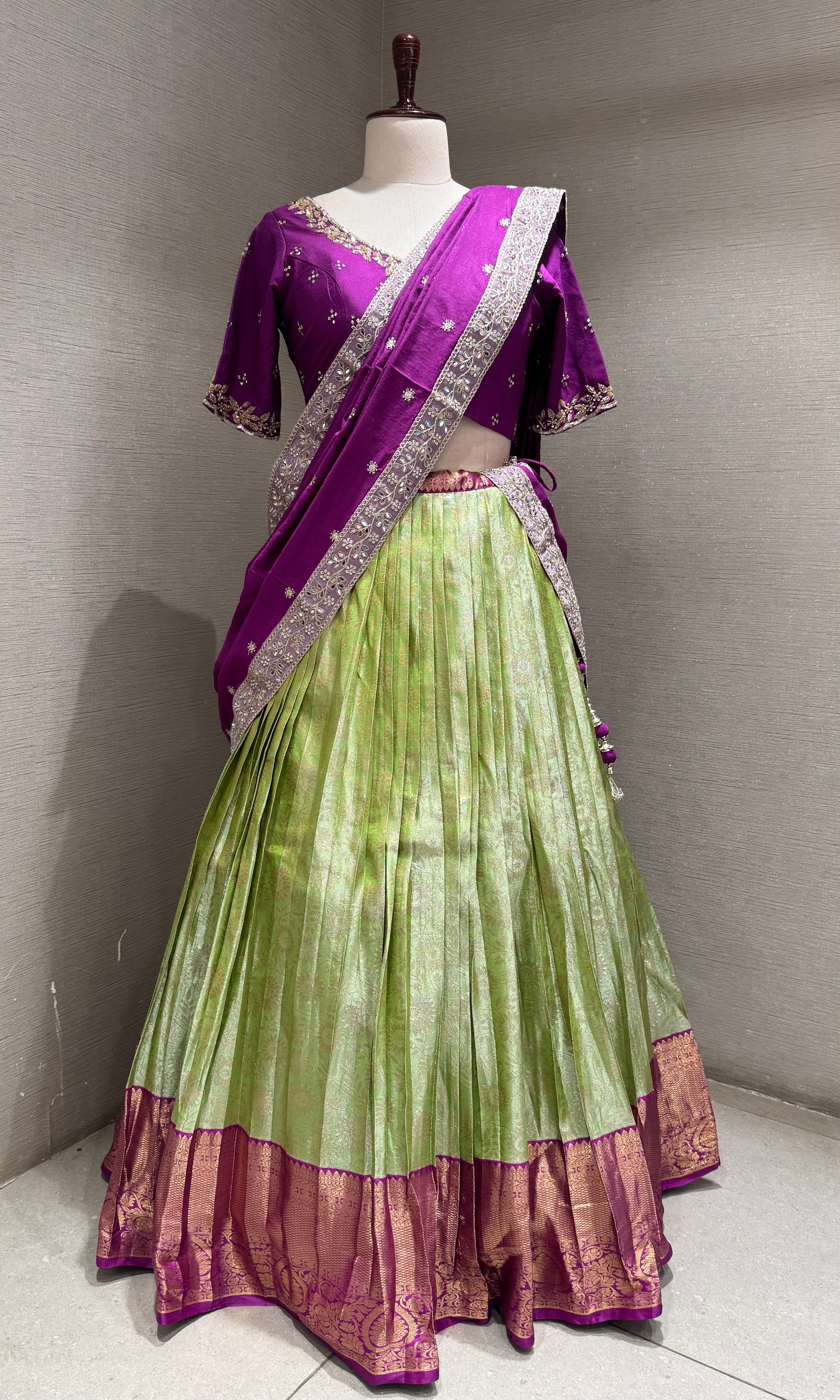 Purple and green banarasi pattu lehenga with embroidered blouse