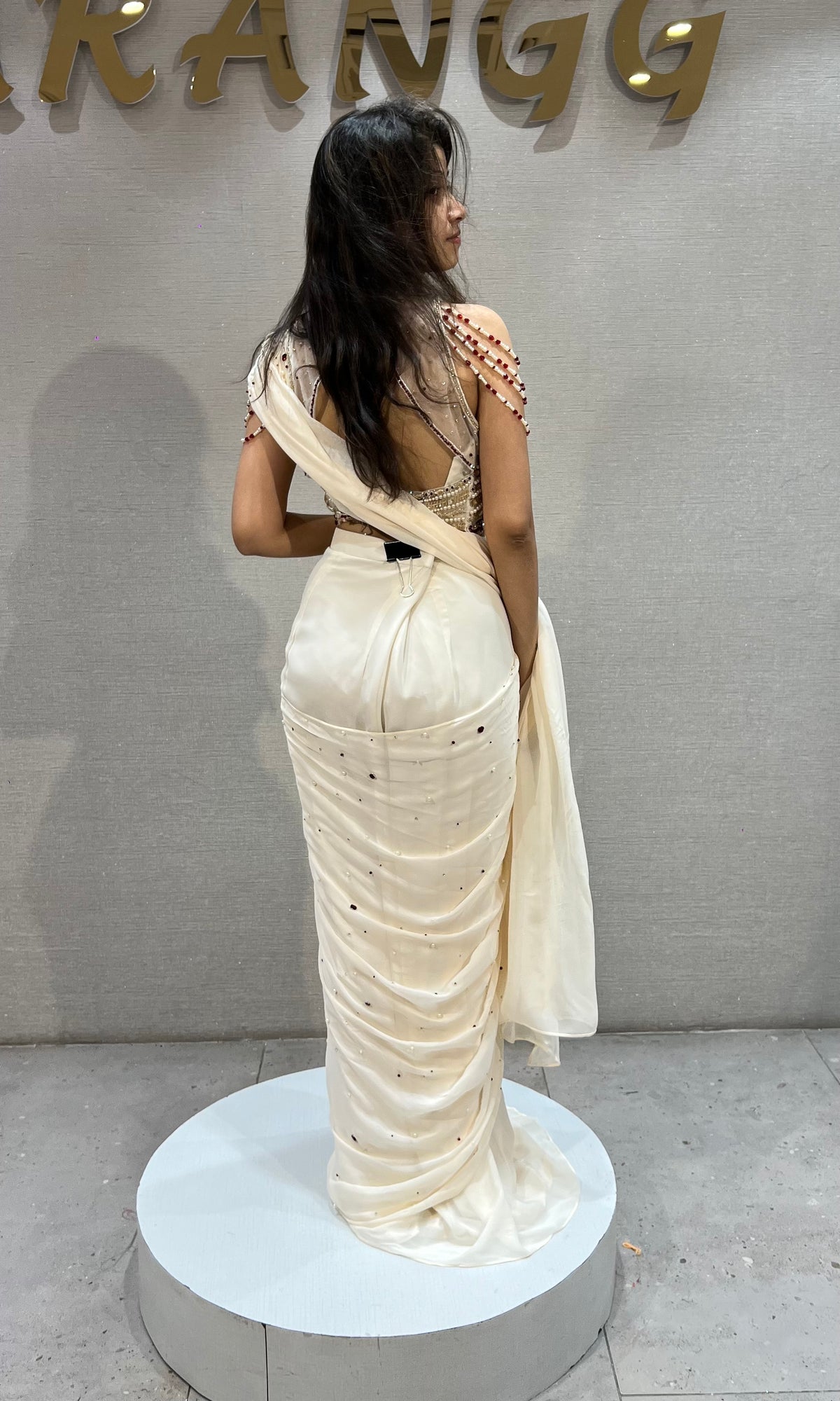 Cream Georgette Saree with Beaded Halter Blouse