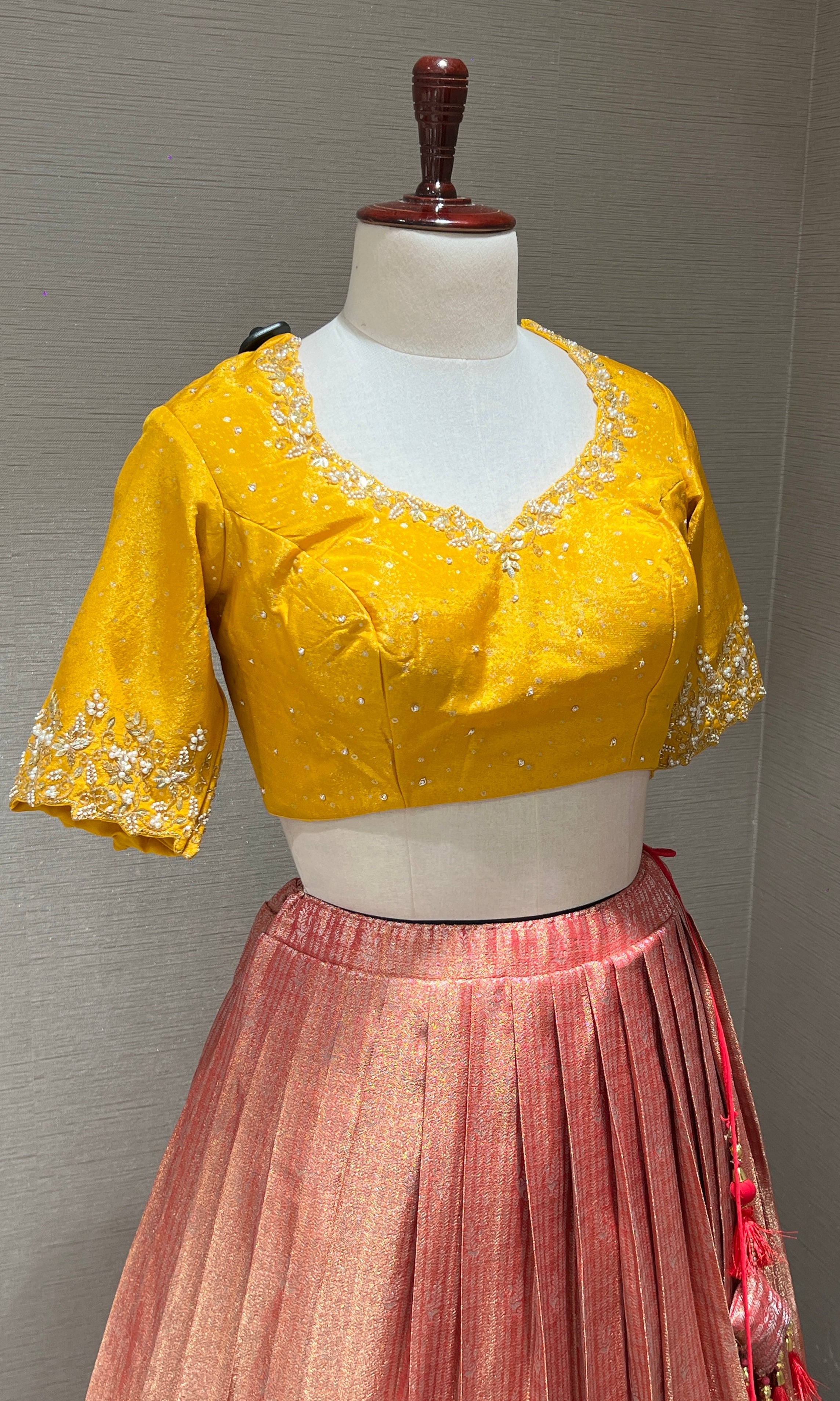 lotus pink lehenga with yellow blouse