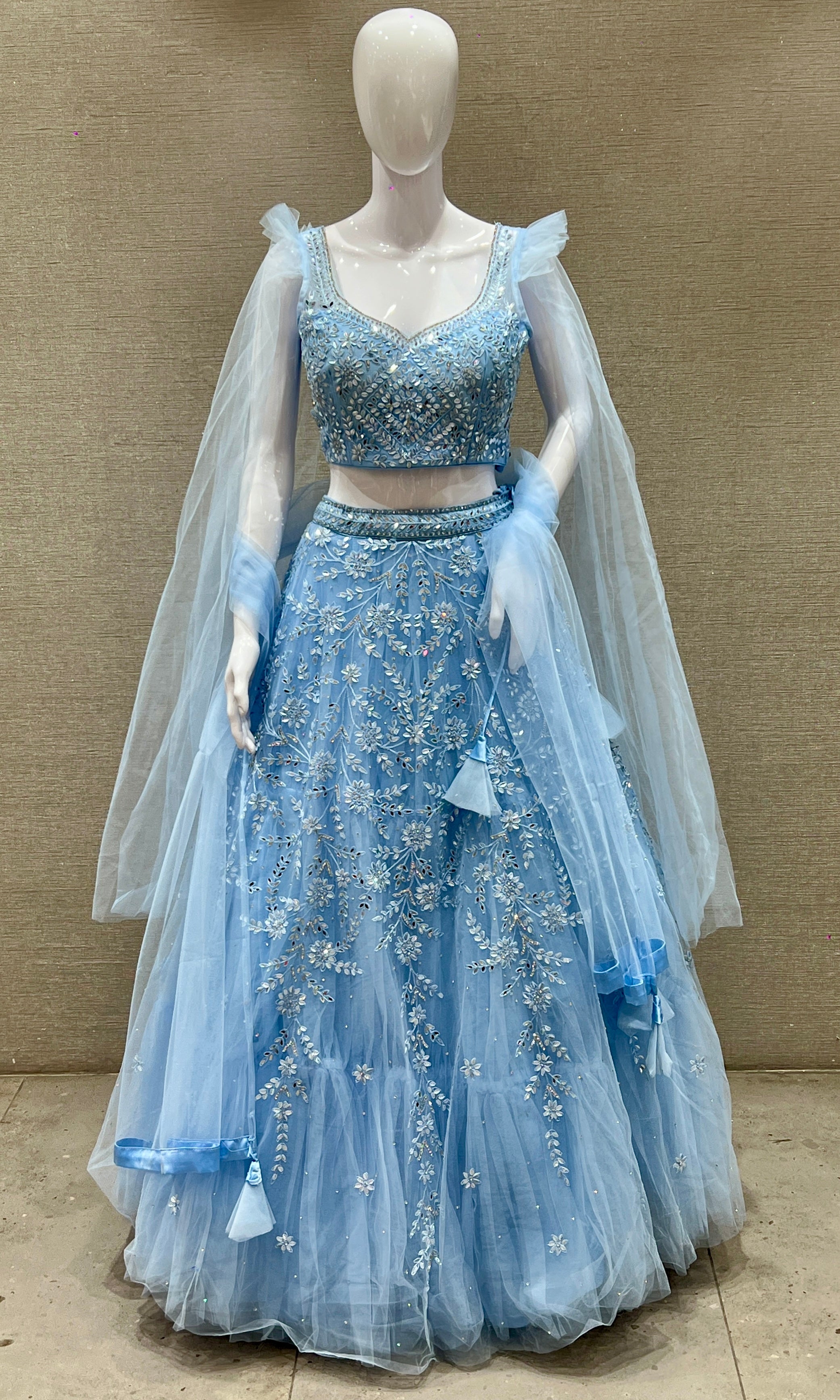 Aarvi β Sky Blue Net Embroidered Lehenga Set