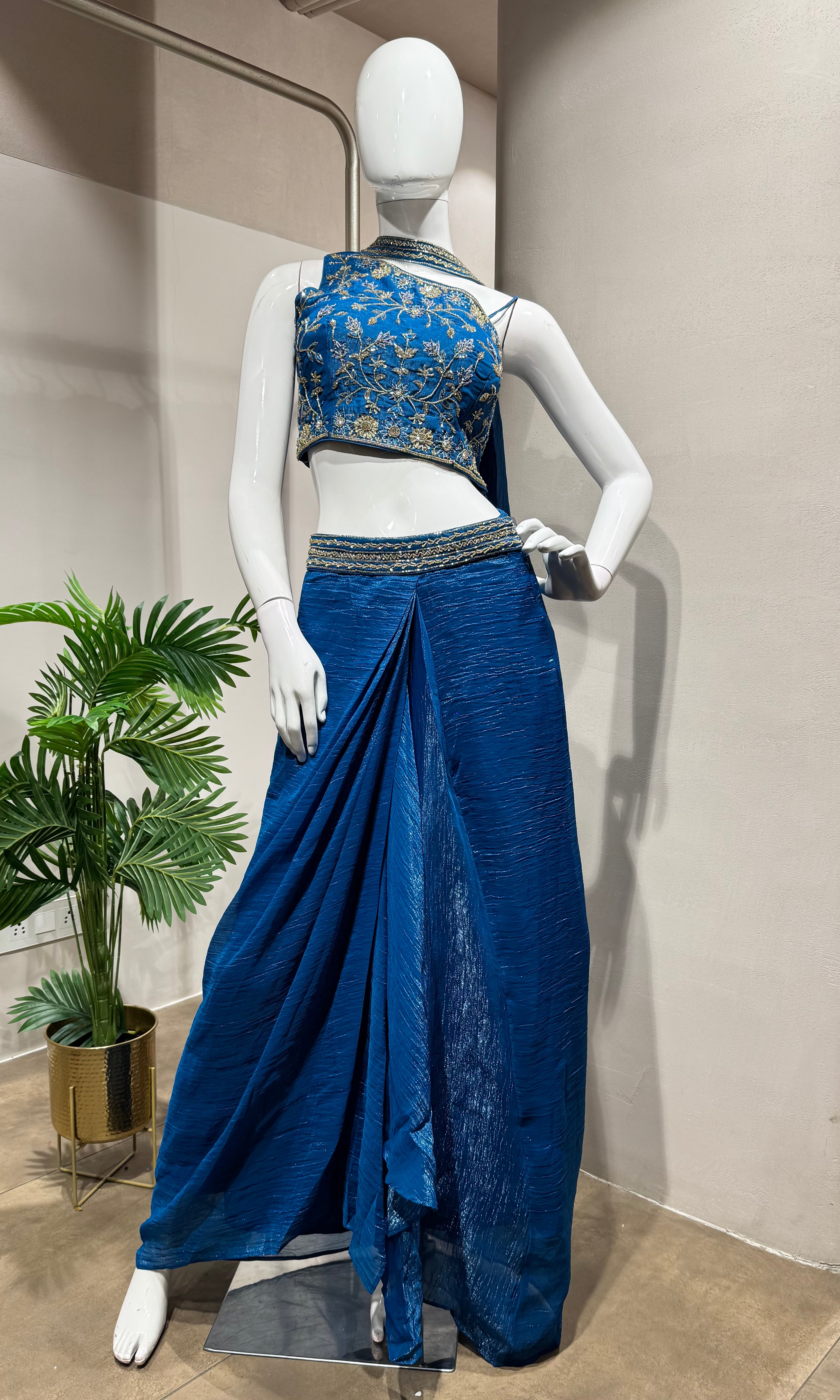 blue draped skirt with embellished blouse