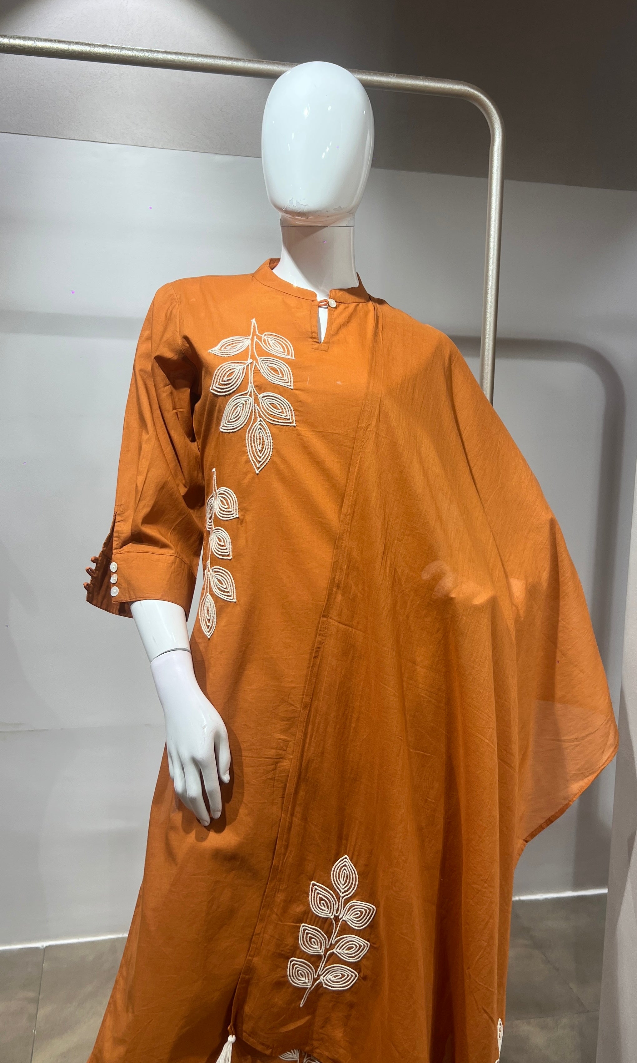 Orange leaf cotton kurta set with tassal dupatta
