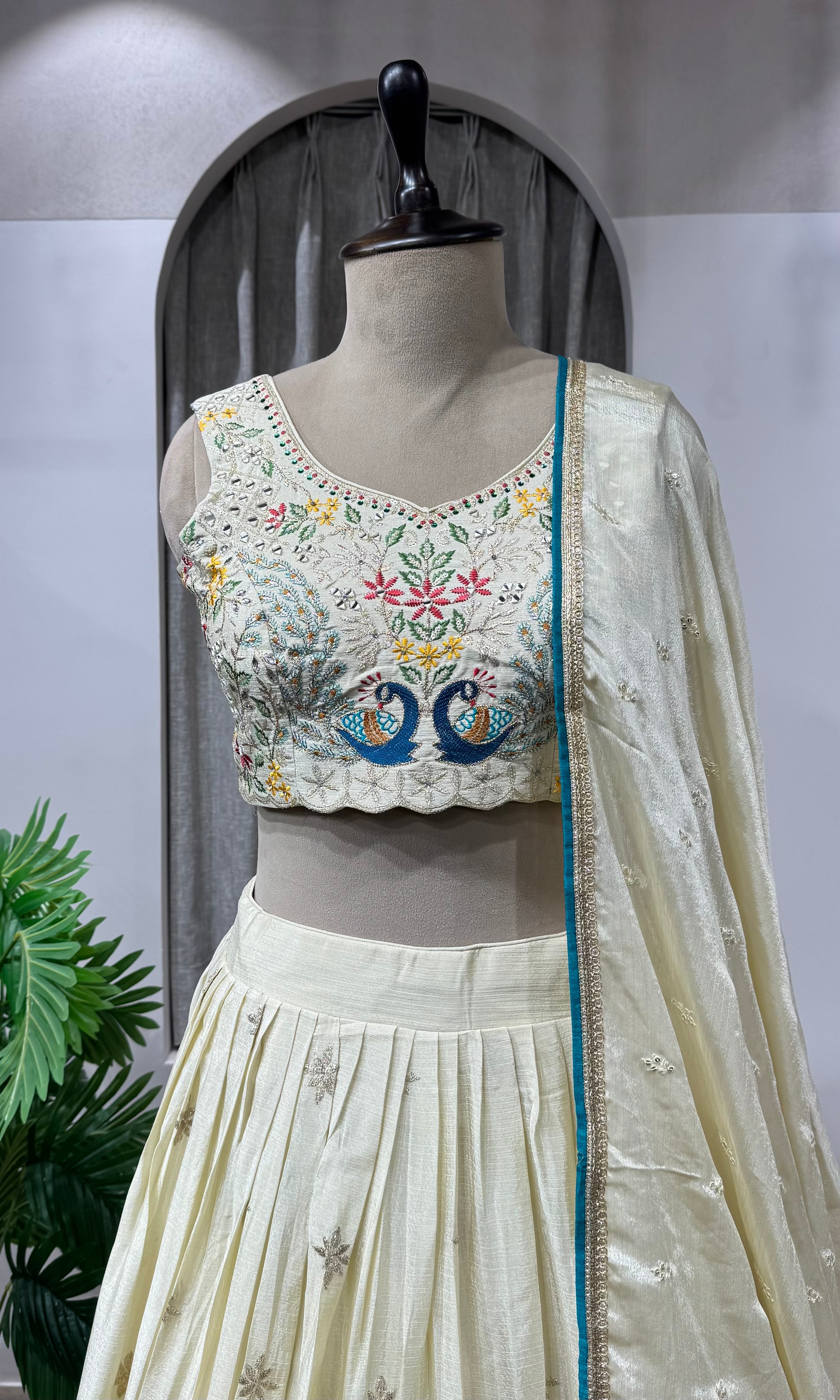 Cream Lehenga with Intricate Peacock Embroidery