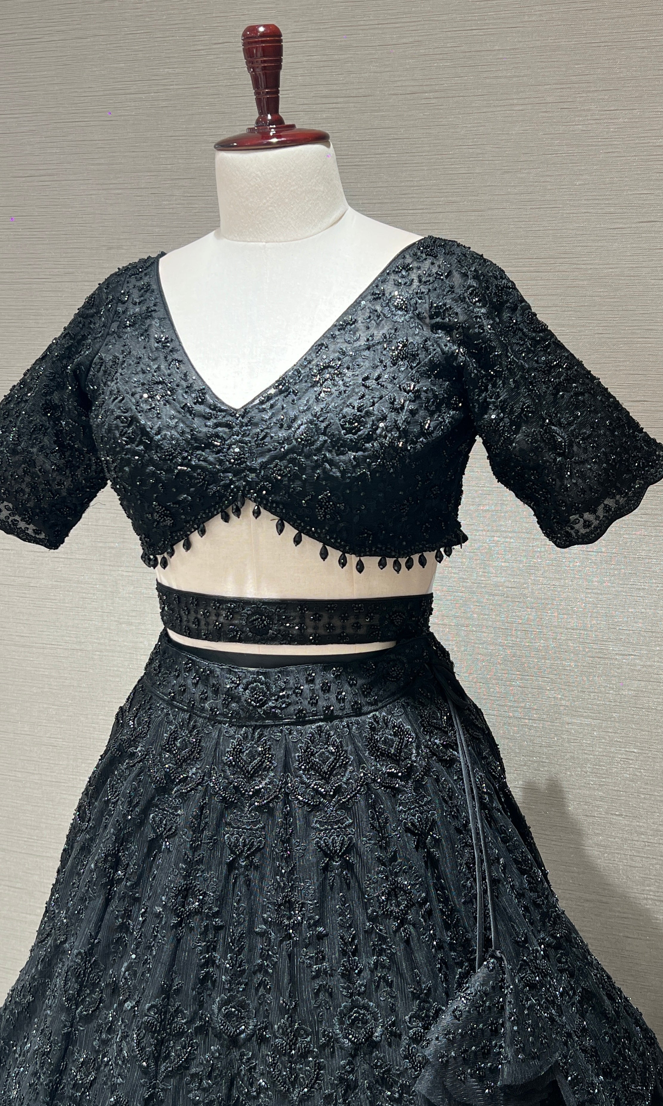 Black lehenga with pretty blouse and netted dupatta