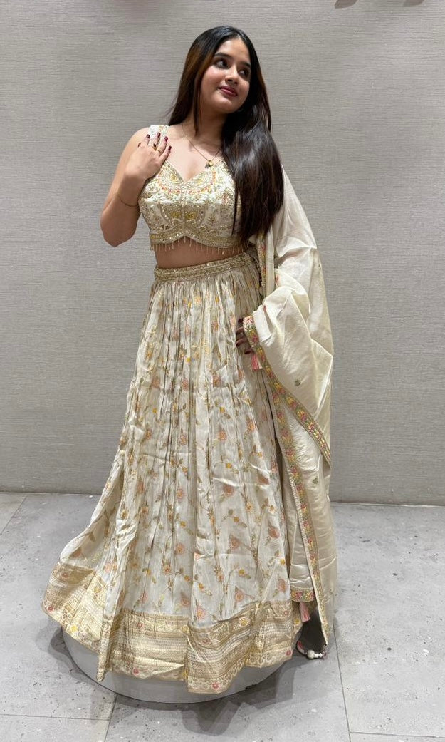 Pearl white lehenga with gold embroidered