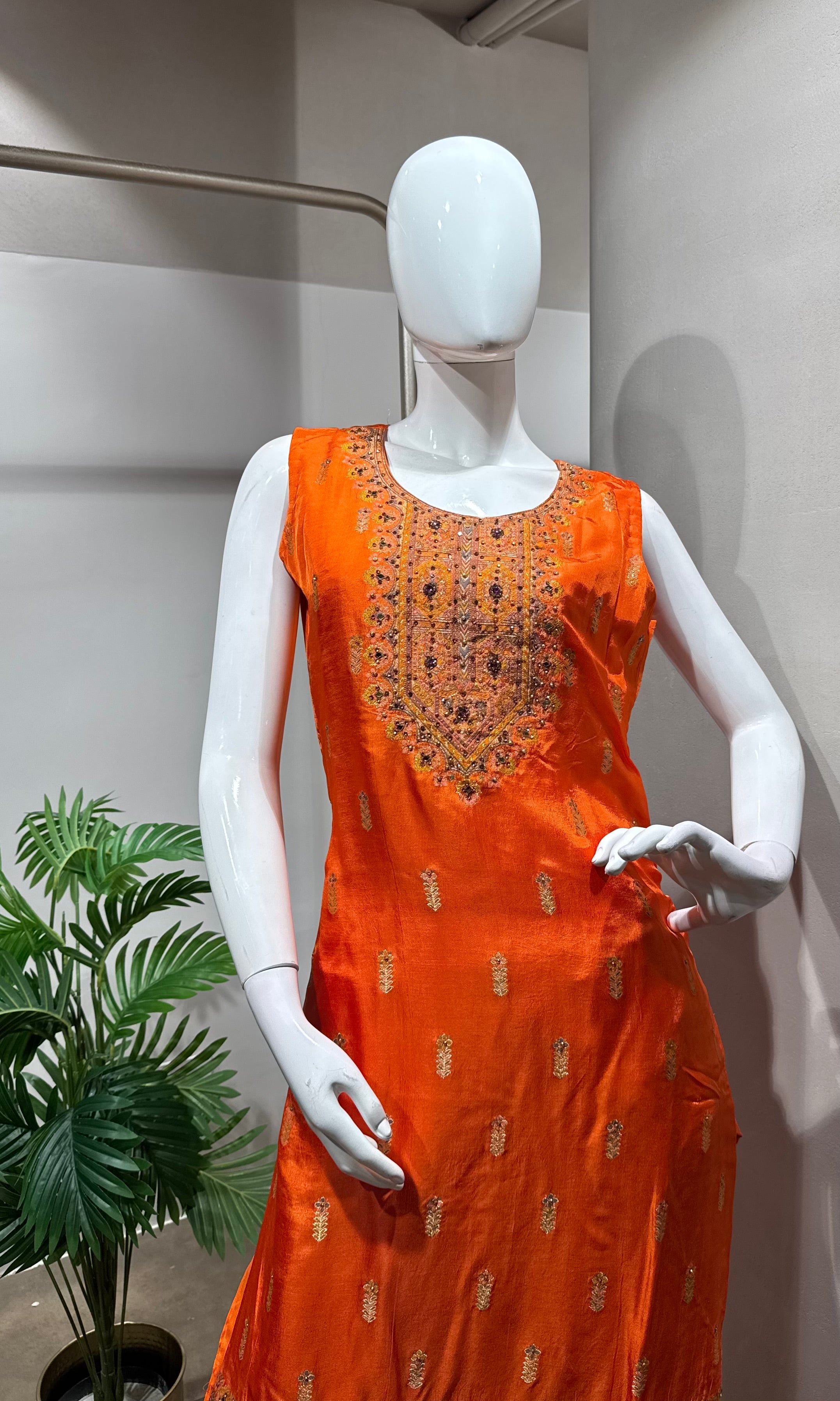orange and gold embroidered kurta set