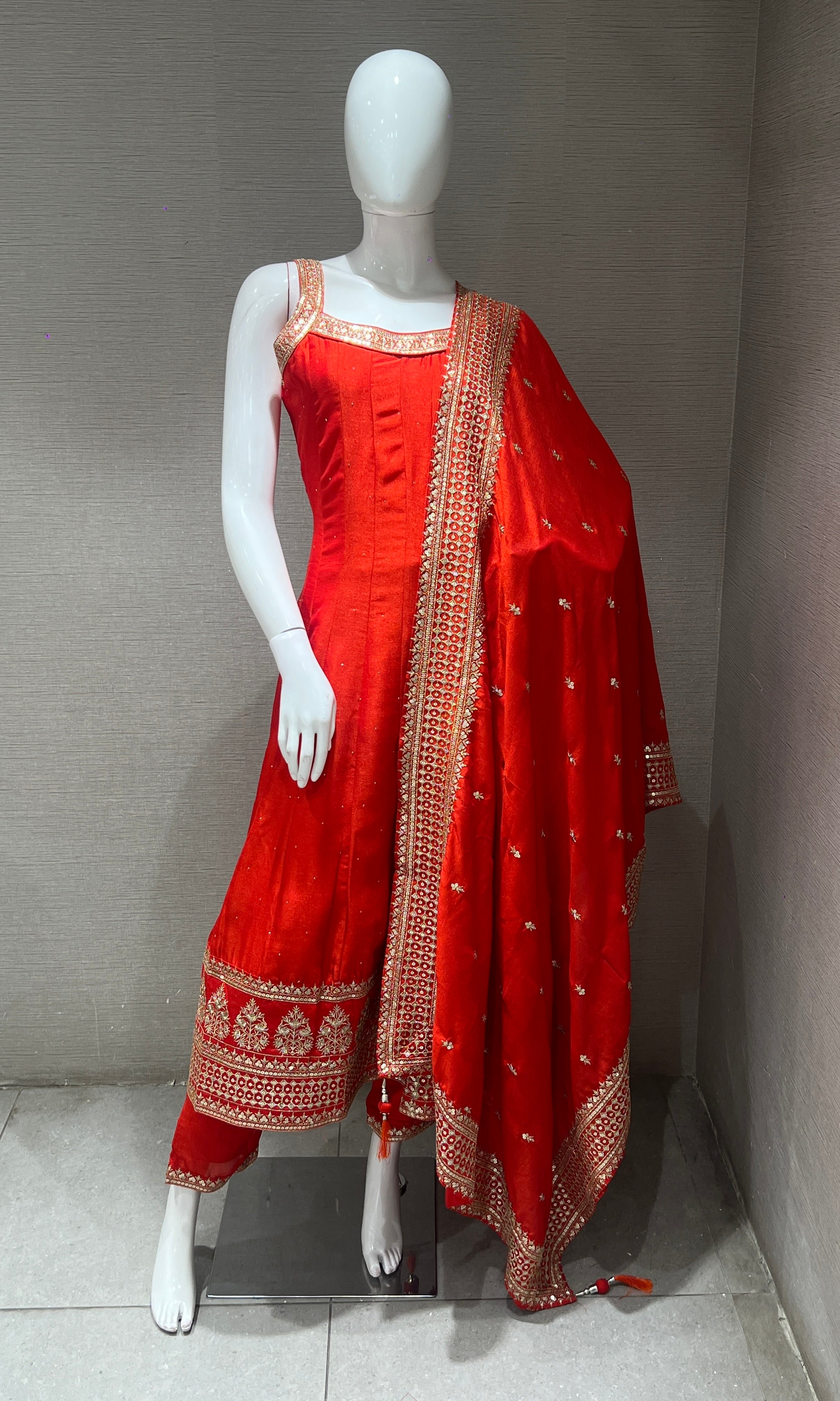 Orange anarkali set with gold embroidery