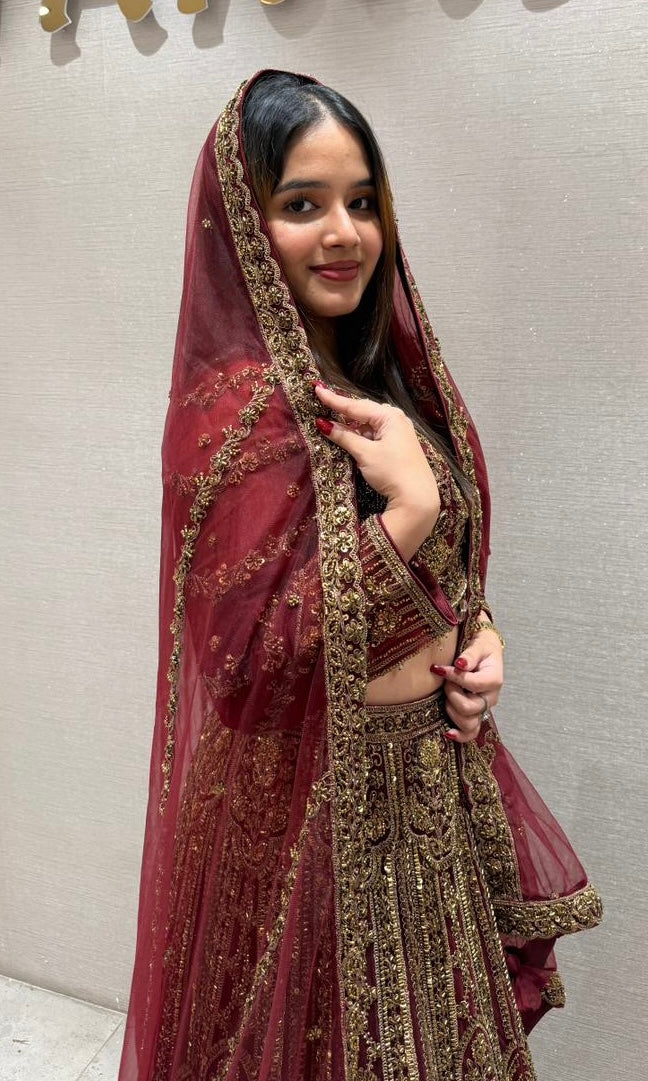 Deep red and gold lehenga
