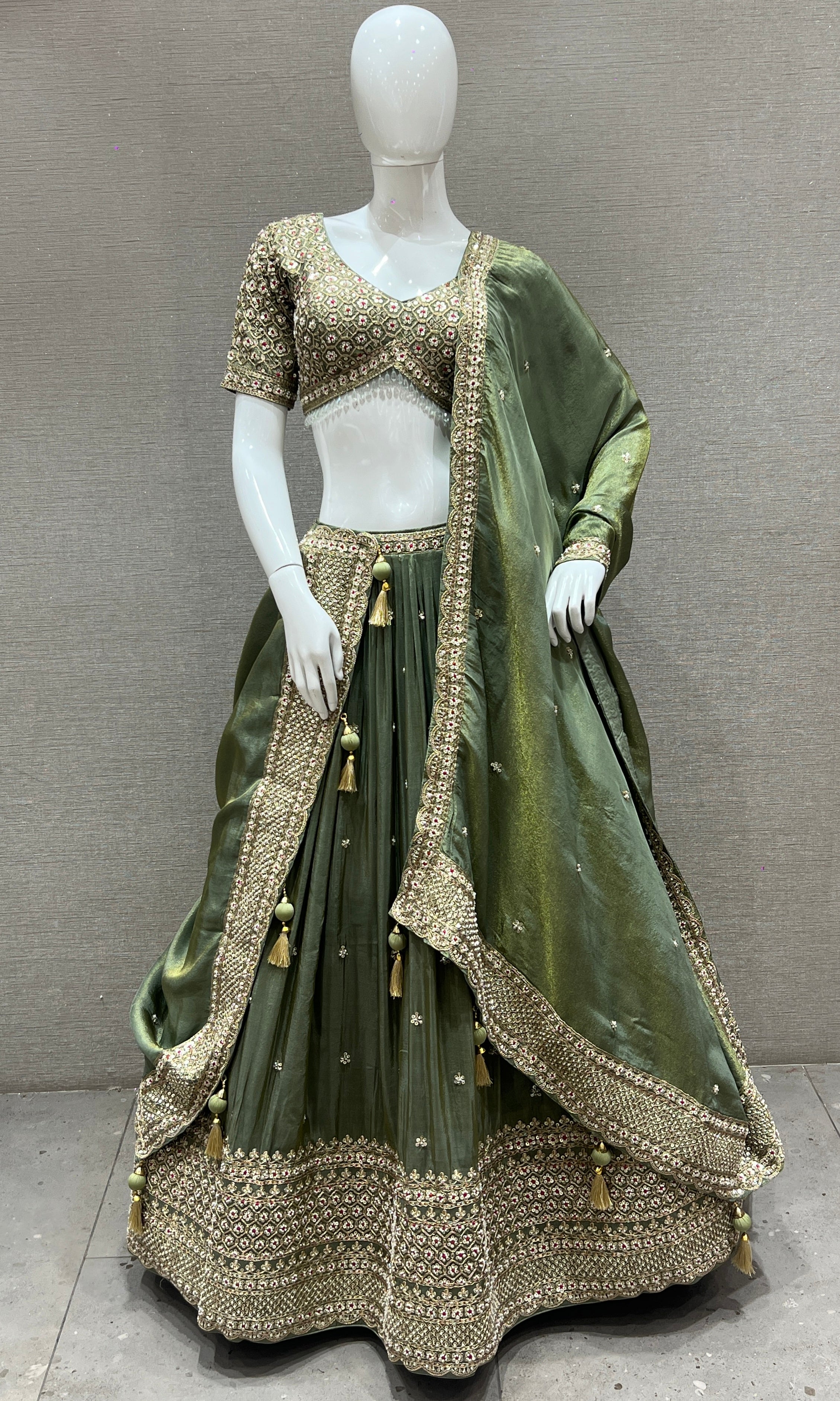 Vanika Sitara - Sage Green Lehenga with Floral & Gold Thread Work Embellishments
