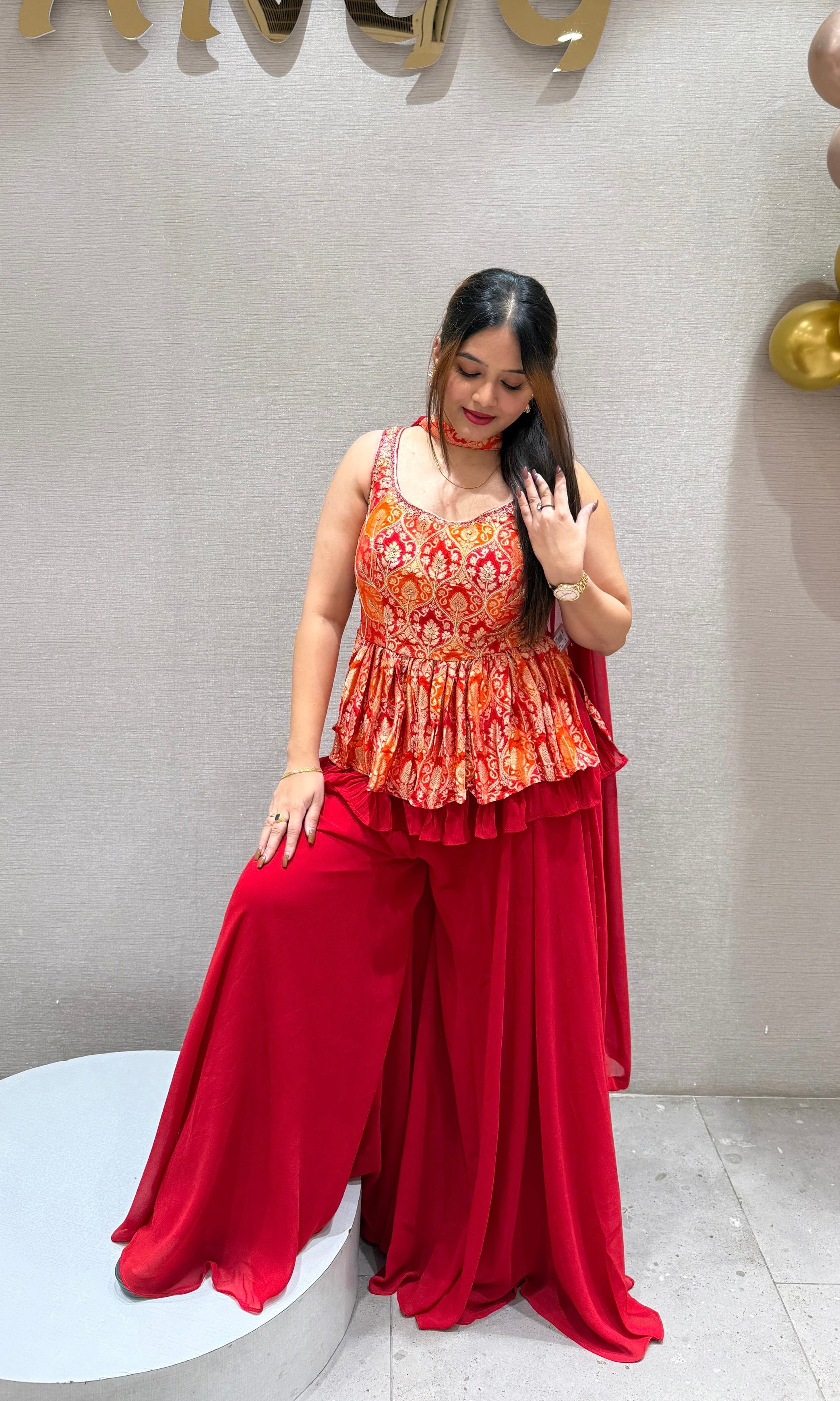 Red palazzo set with peplum top