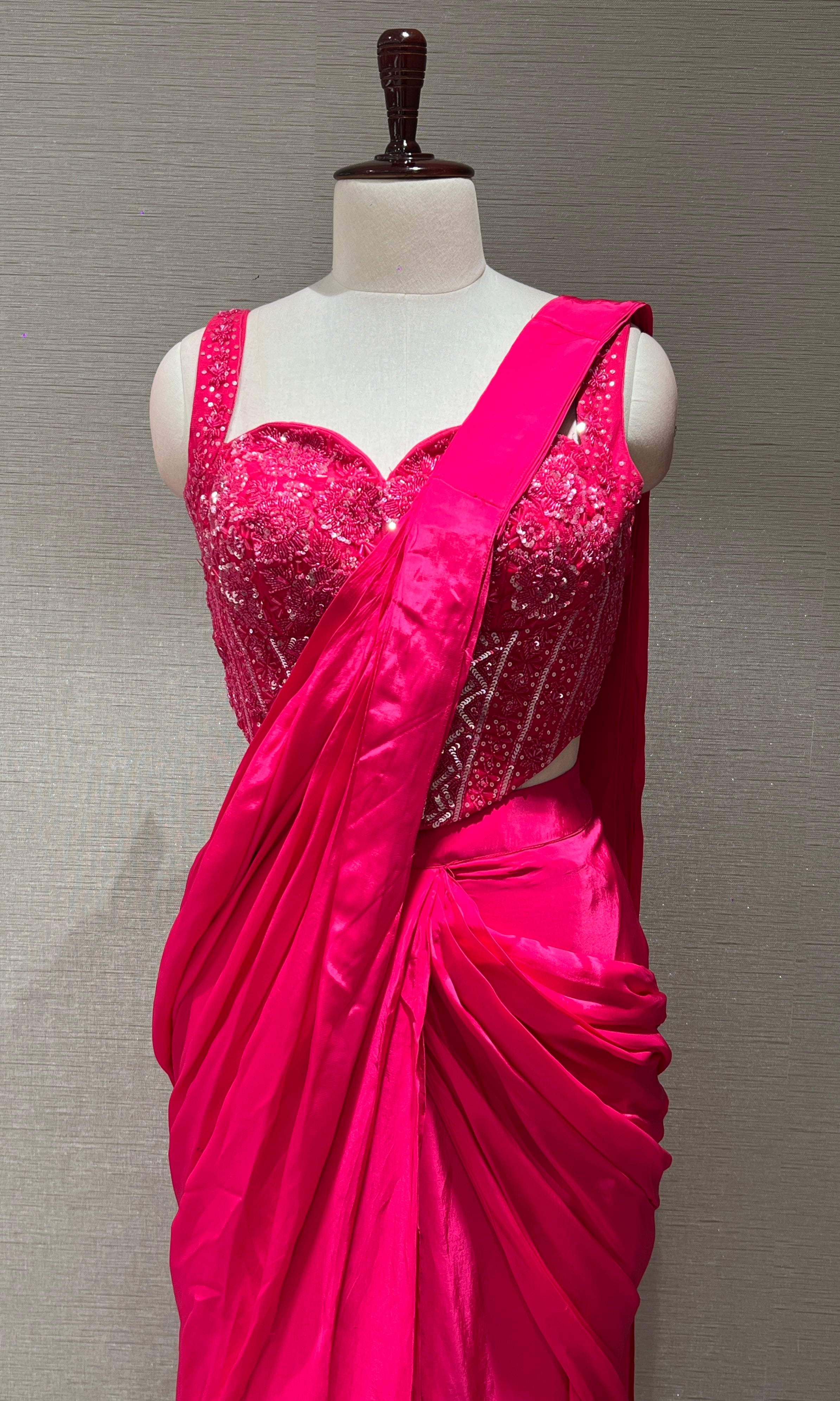 Pink drape saree with corset blouse