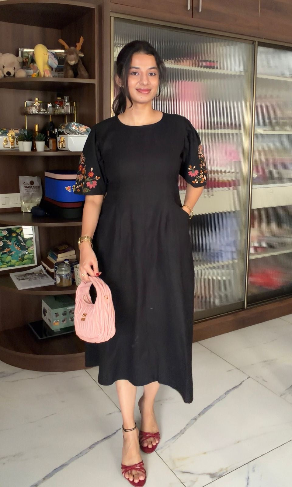 Black dress with embroidered puff sleeves