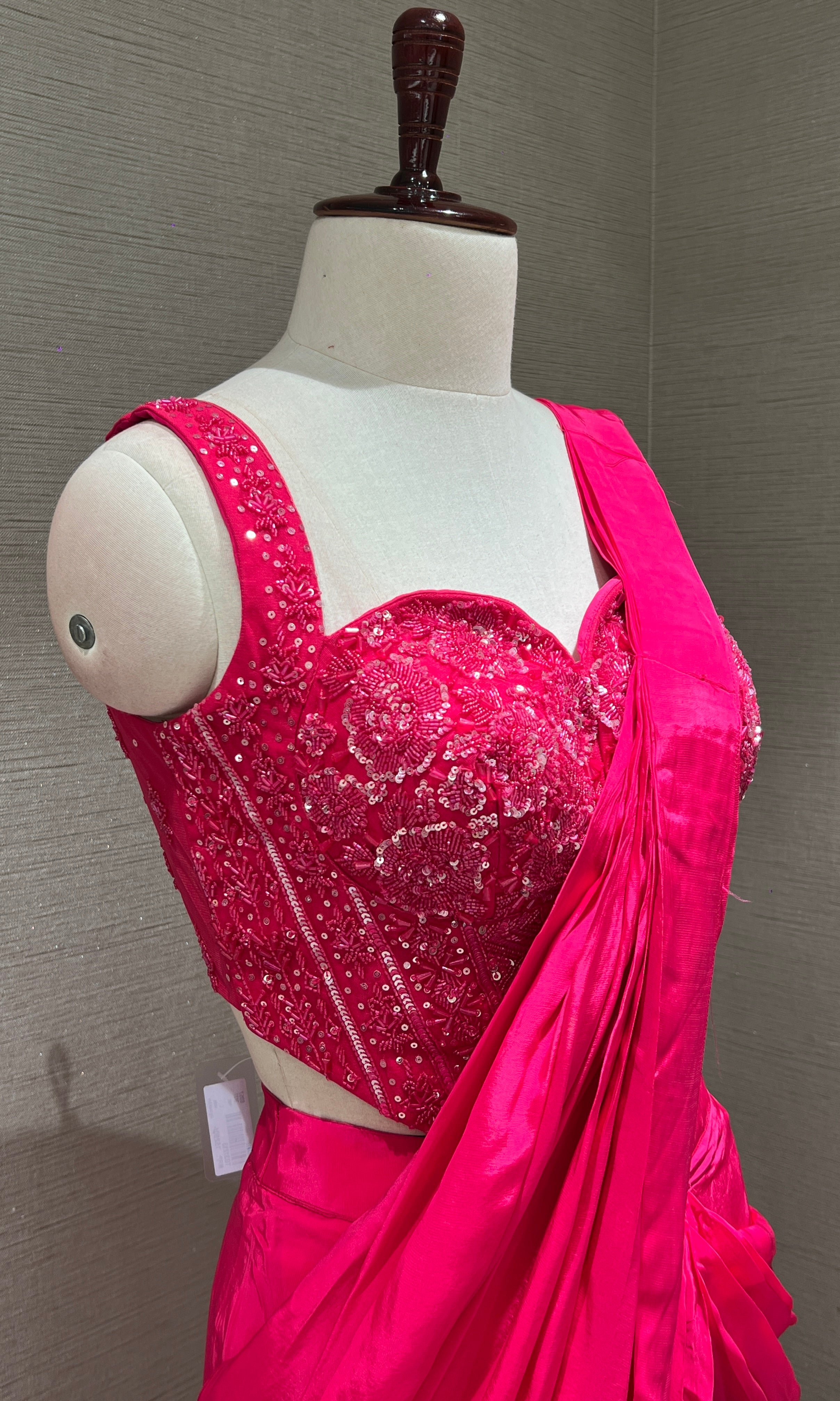 Pink drape saree with corset blouse