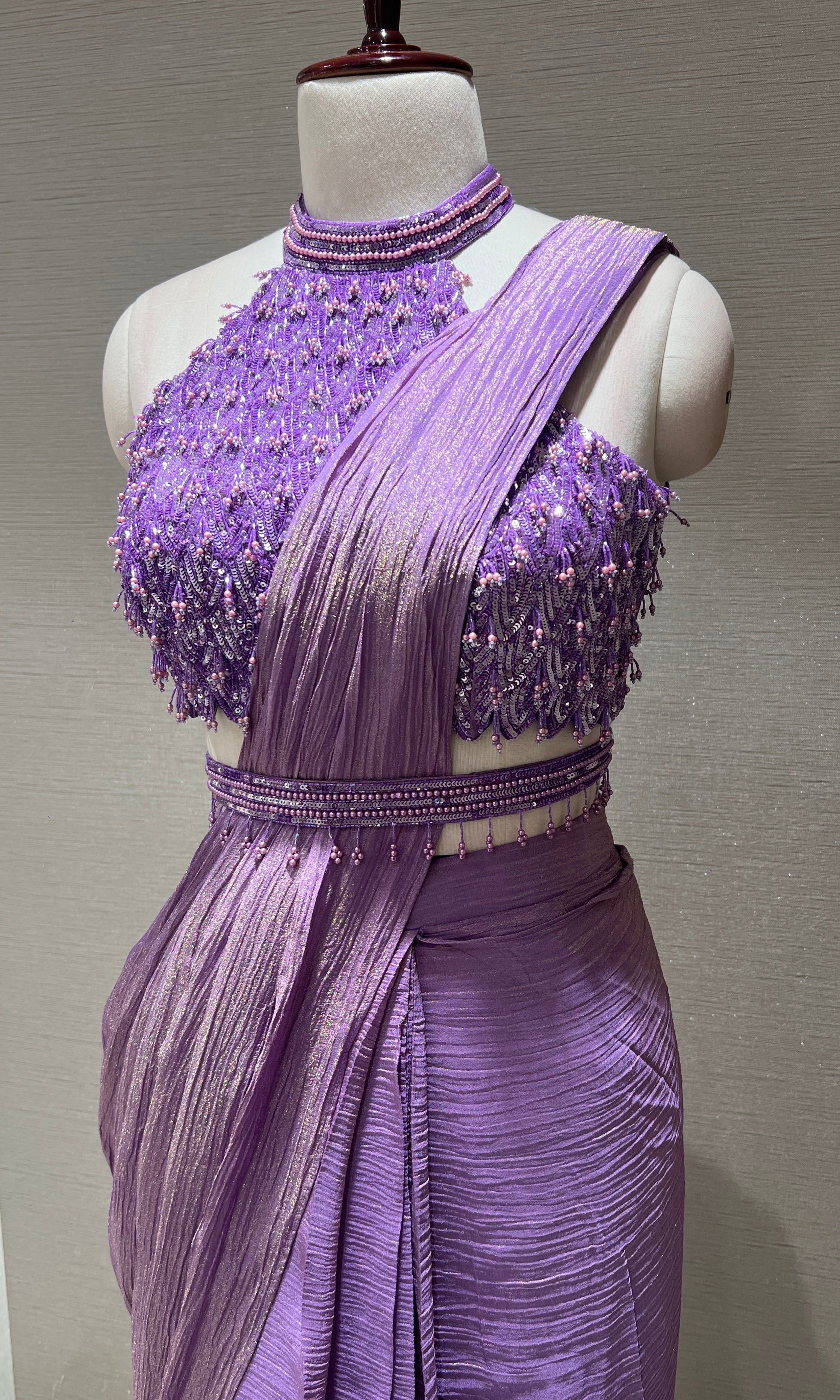 Purple drape saree with halter neck blouse