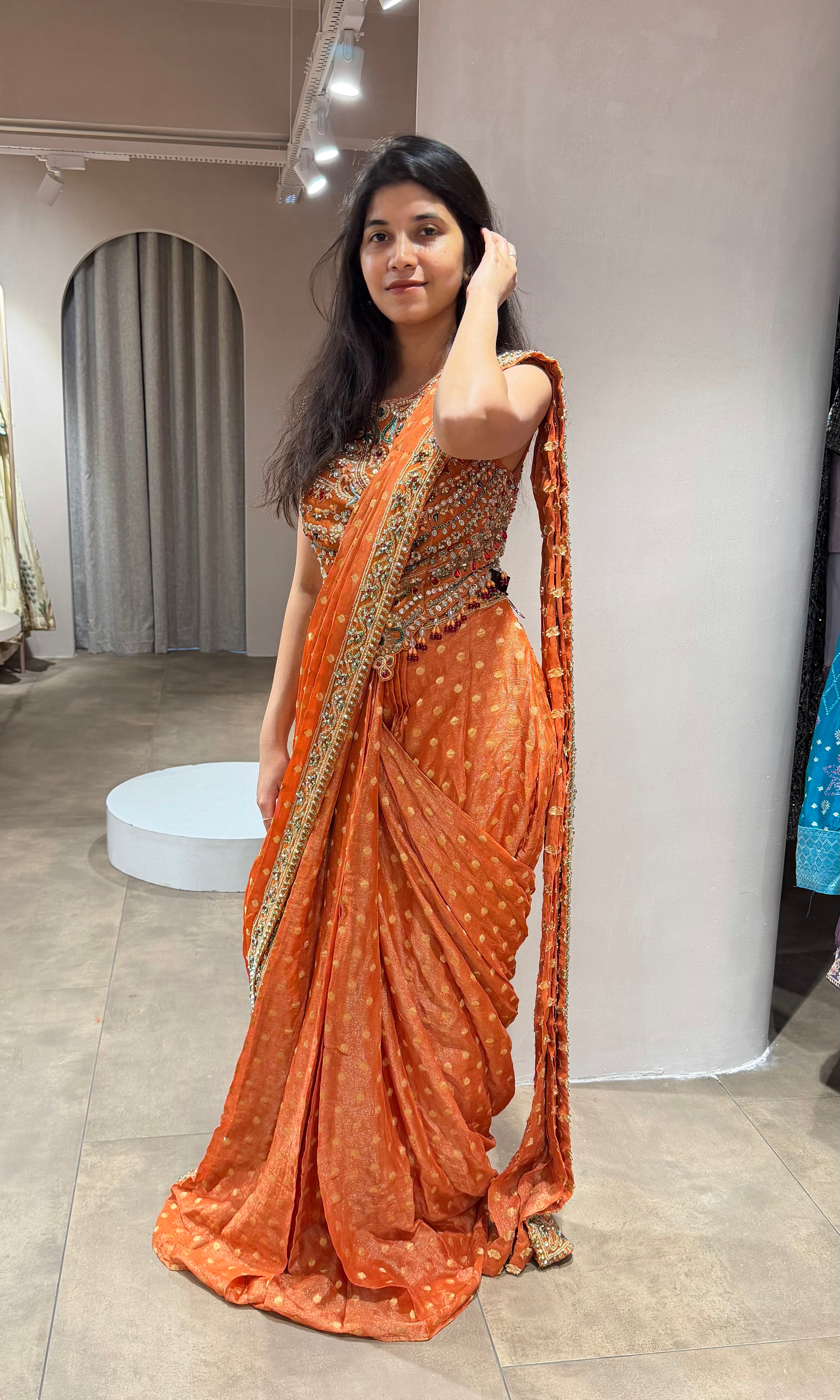 Orange INTRICATE EMBROIDERED drape saree
