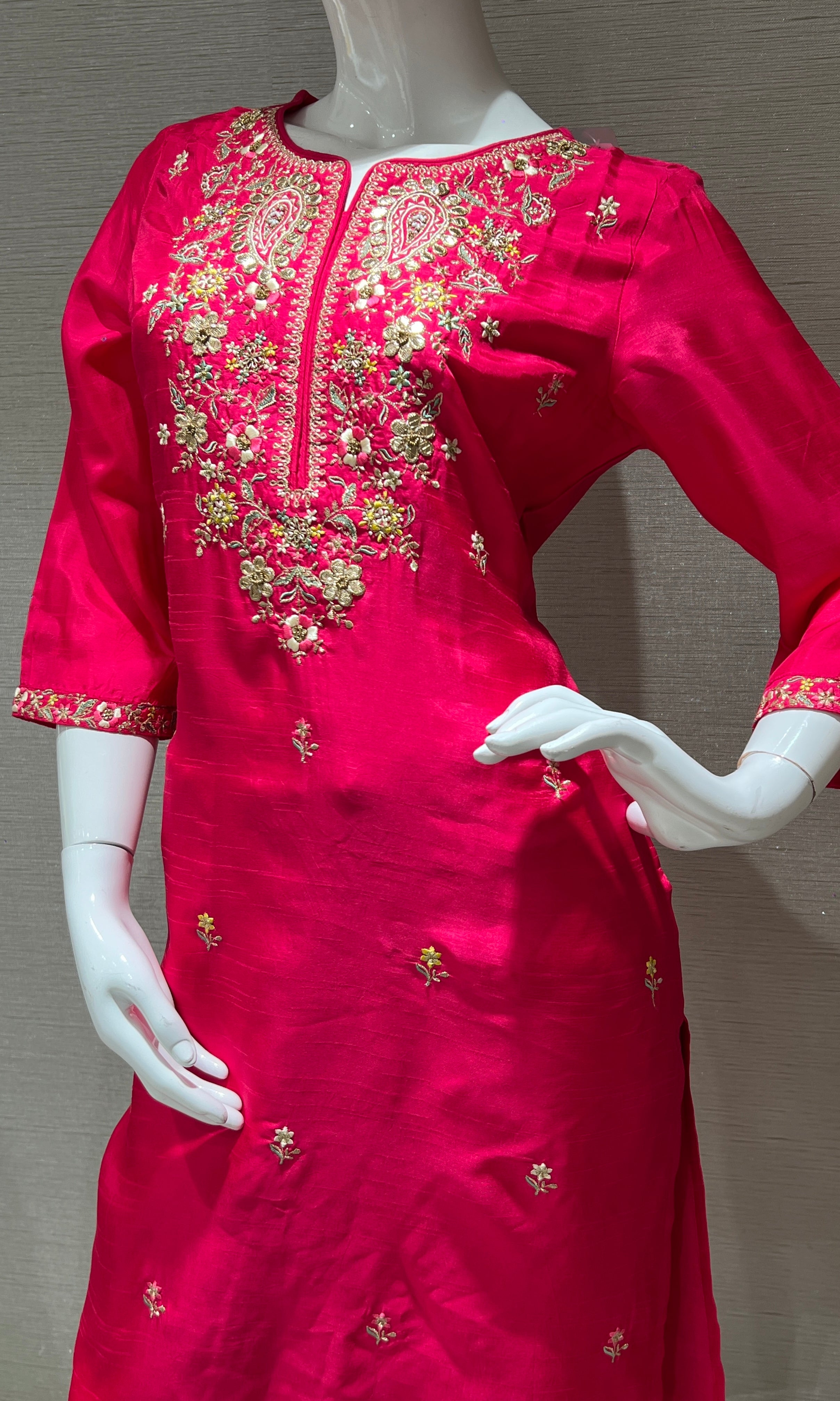 Pink kurta set with a yellow dupatta