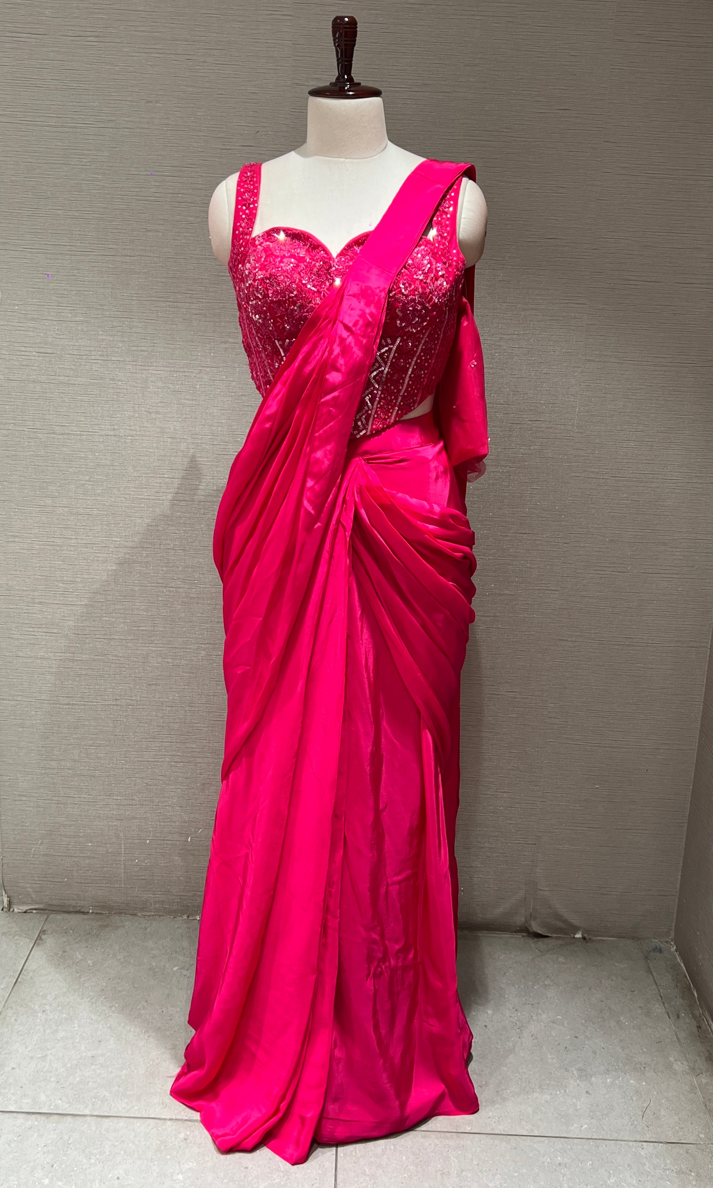 Pink drape saree with corset blouse