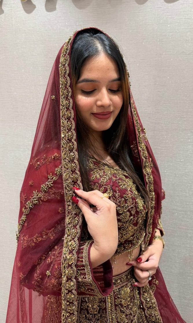Deep red and gold lehenga