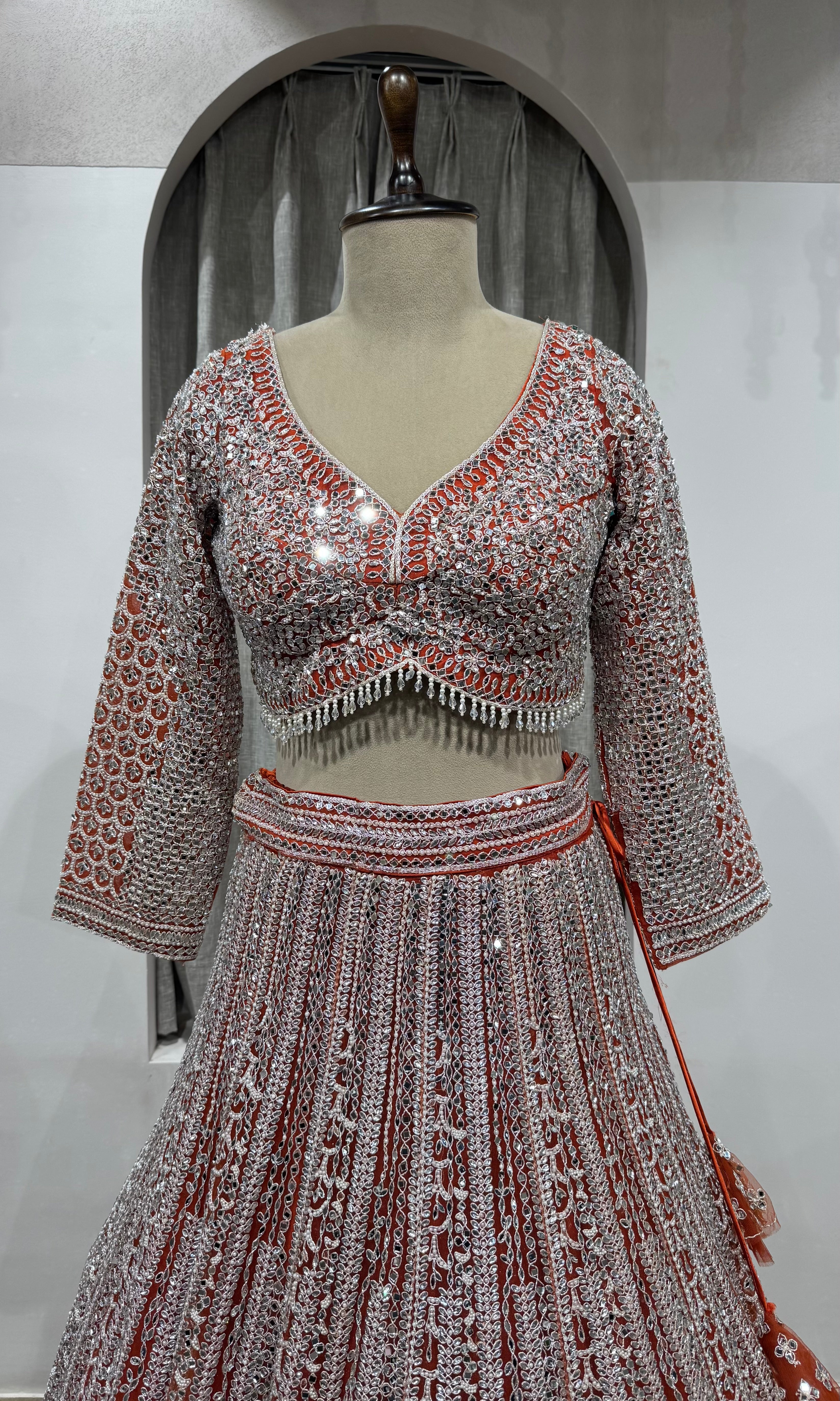 Rust and grey heavy bridal lehenga