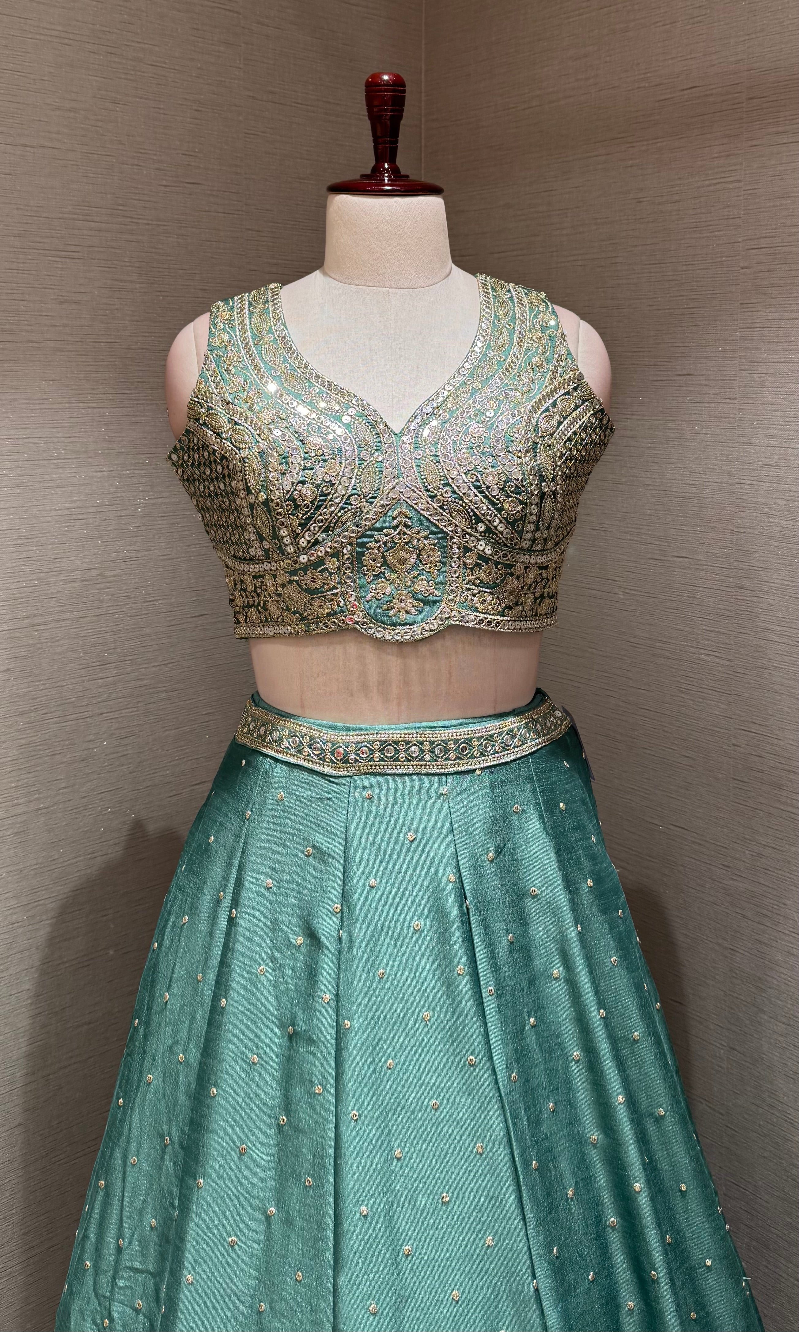 Green Flared Lehenga Choli with Heavy Gold Embroidery