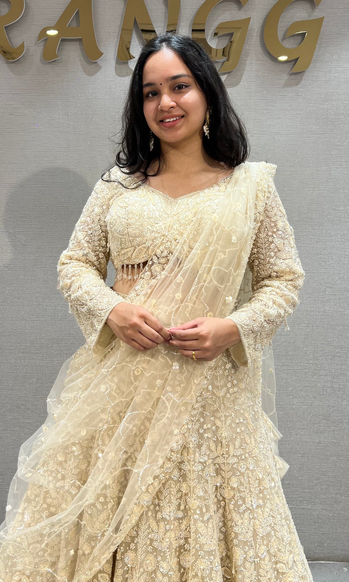 Cream soft net intricate floral Embroidery bridal lehenga