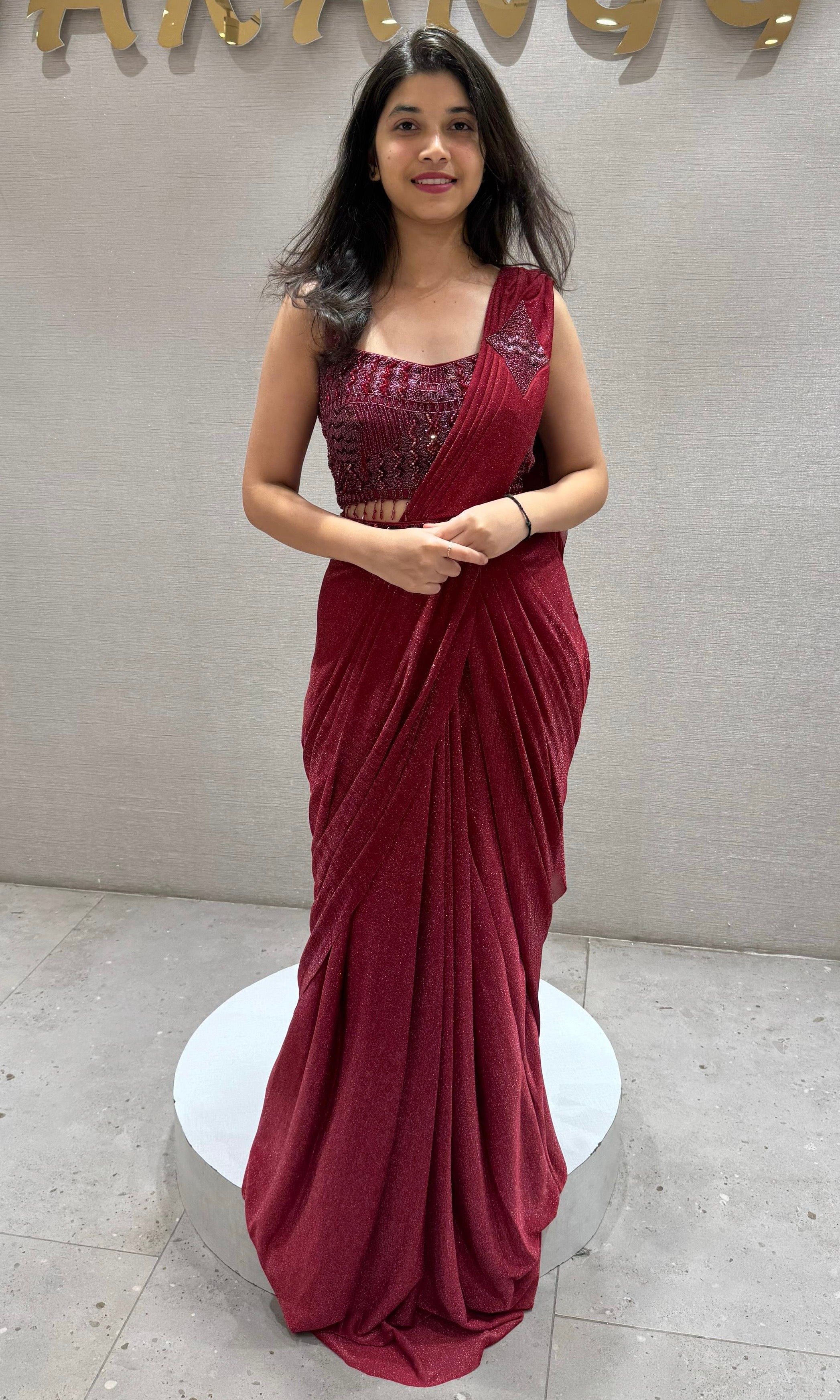 Maroon sequin embroidered drape saree