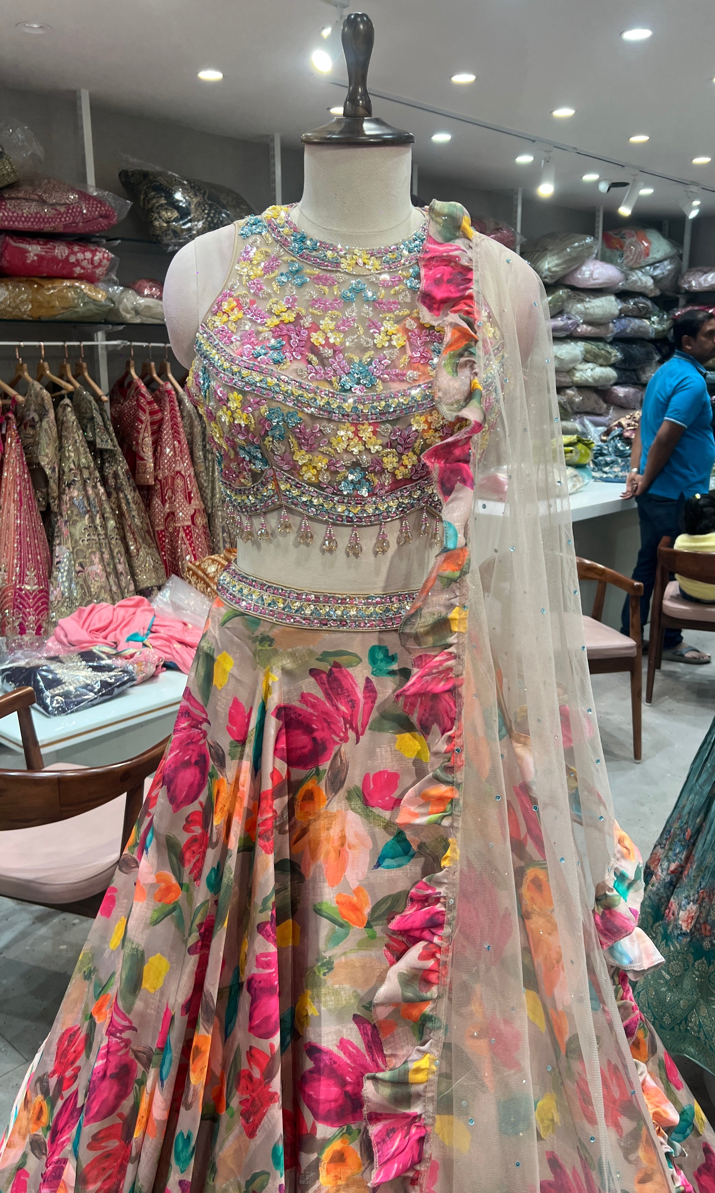 floral silk lehenga with intricate halter neck blouse