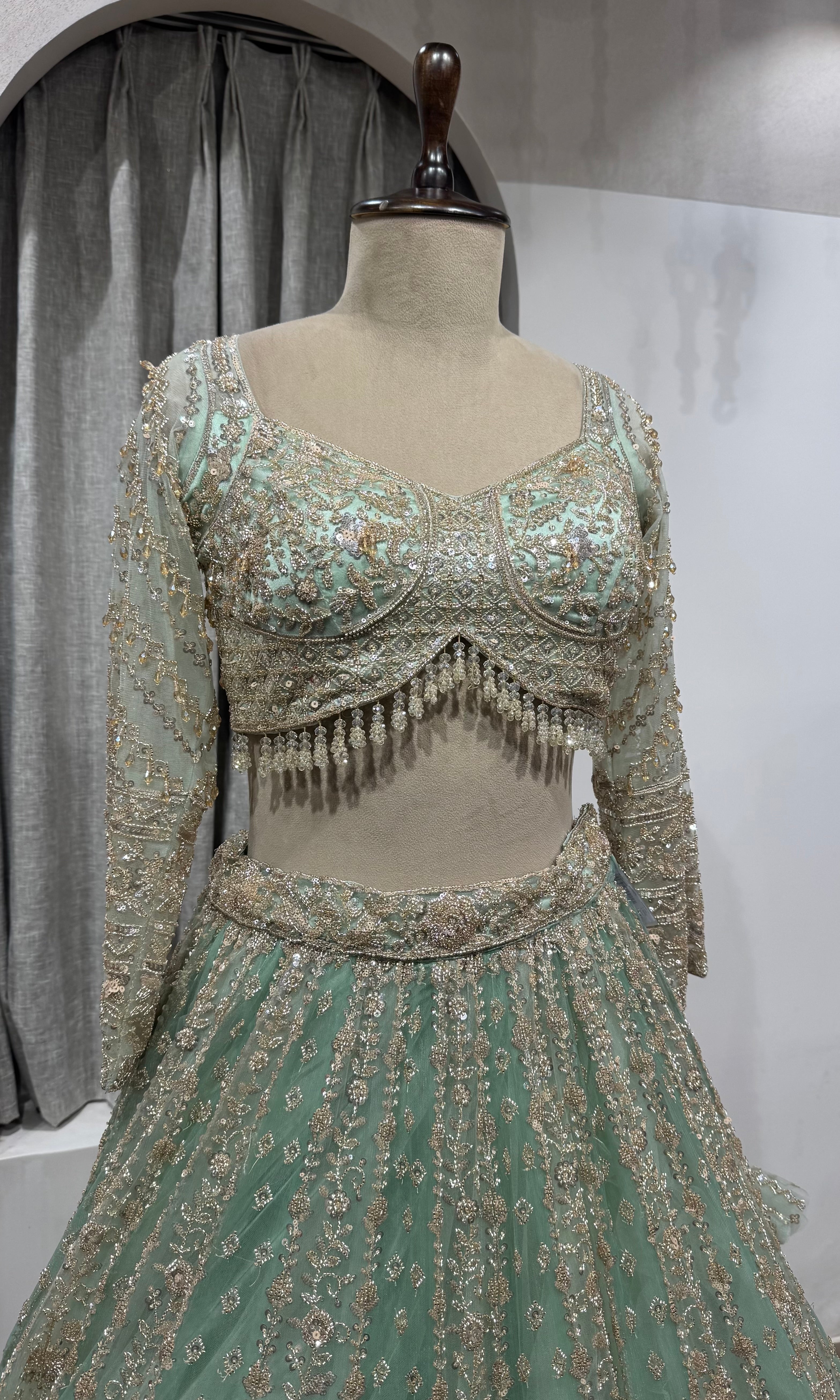 Pista Green Bridal Lehenga with Shimmering Border