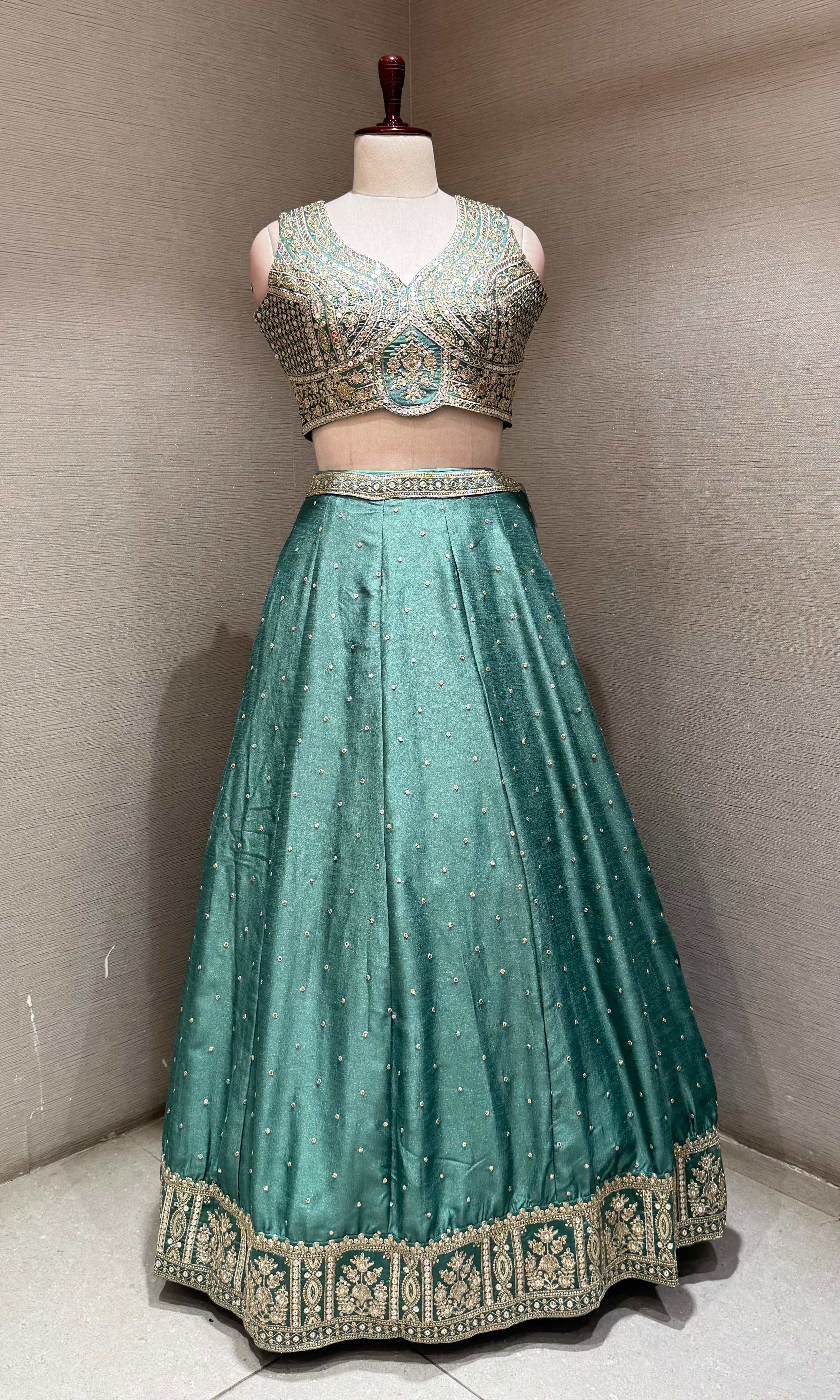 Green Flared Lehenga Choli with Heavy Gold Embroidery