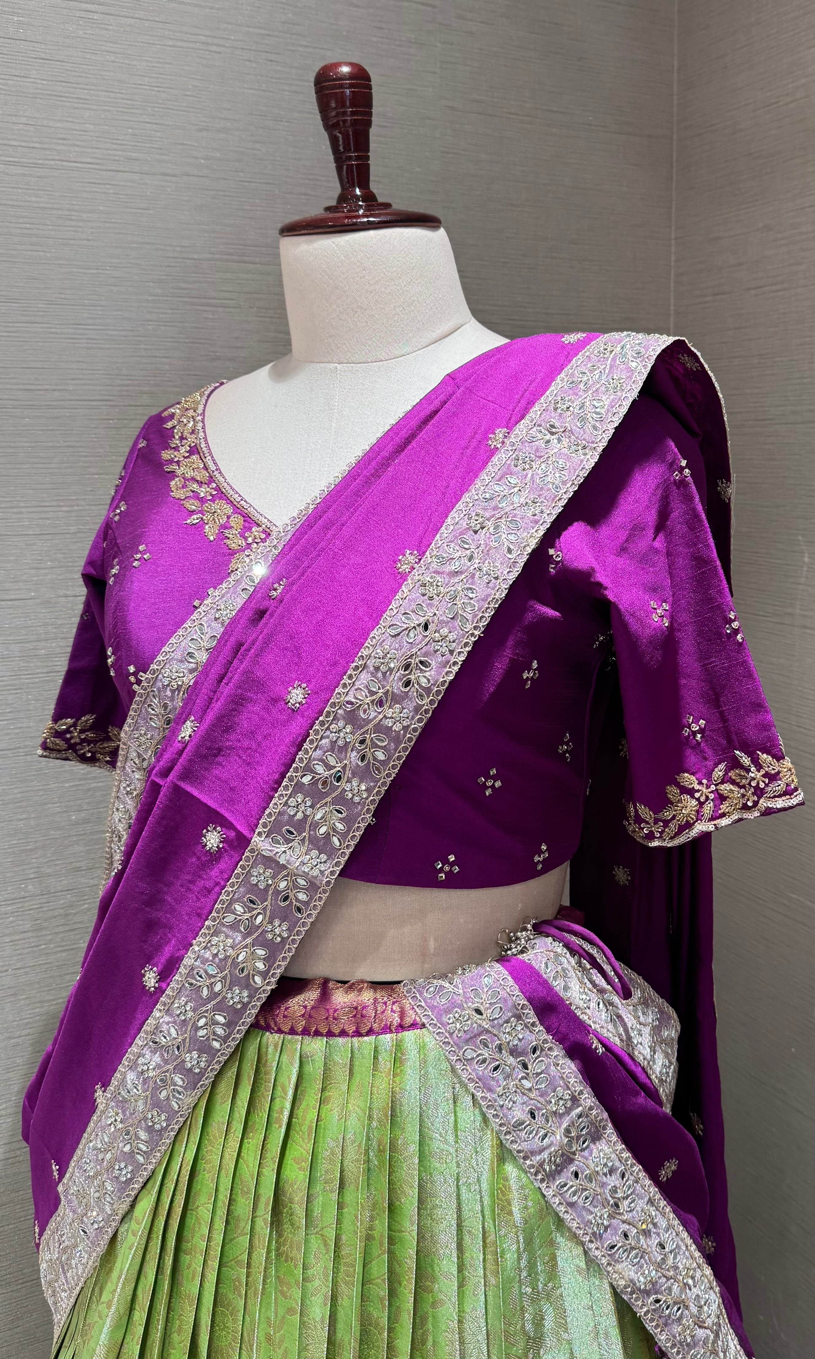 Purple and green banarasi pattu lehenga with embroidered blouse