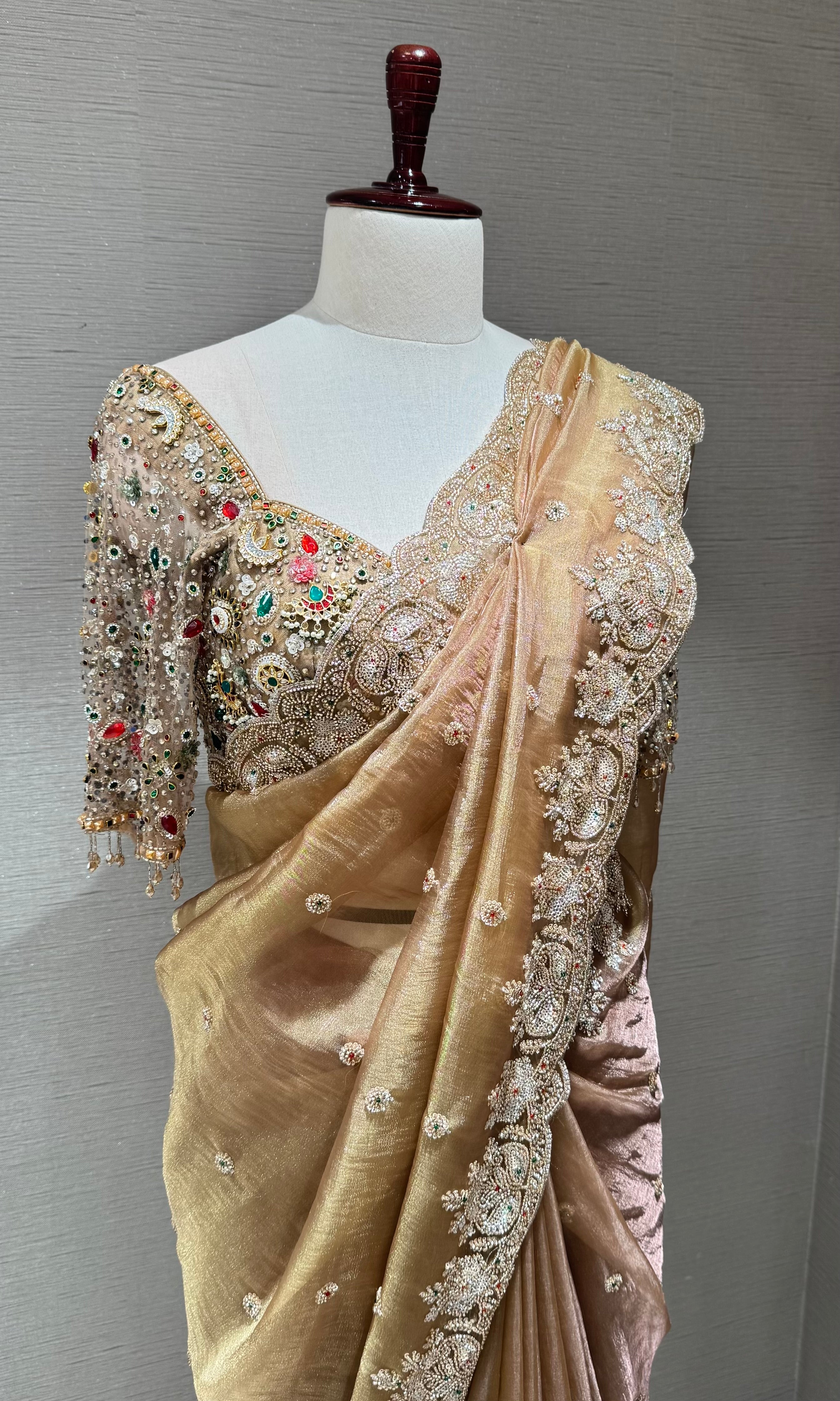 beige net designer saree with embroidered blouse