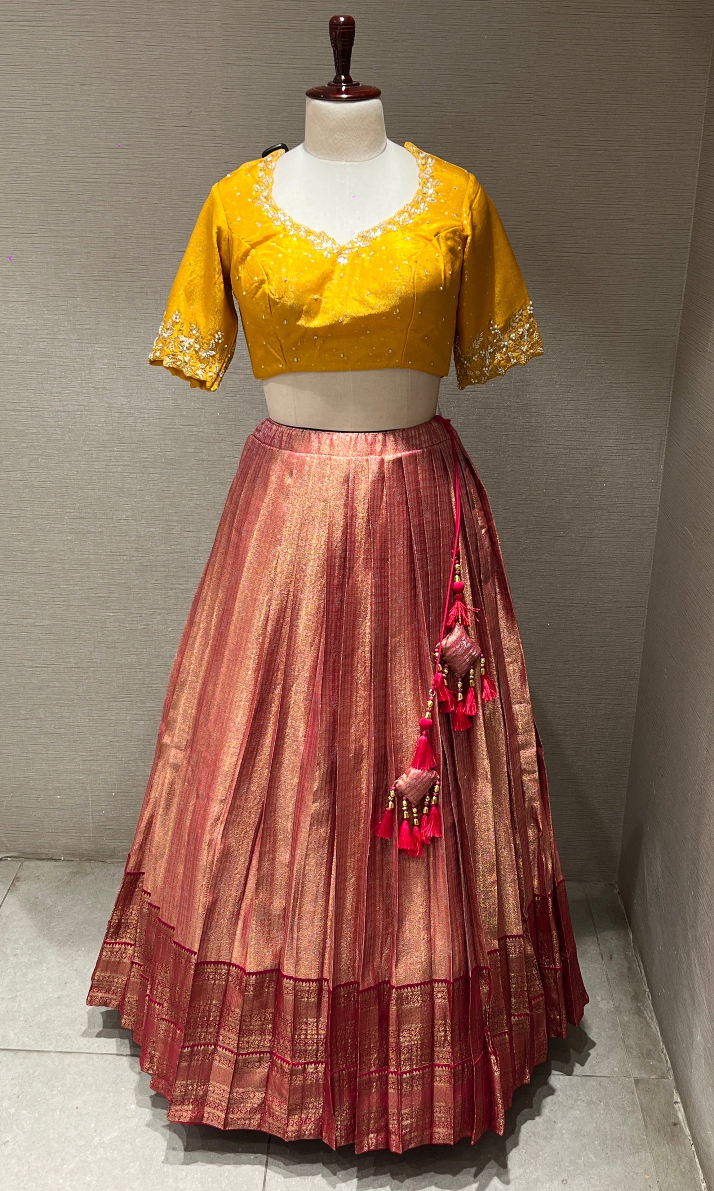 lotus pink lehenga with yellow blouse