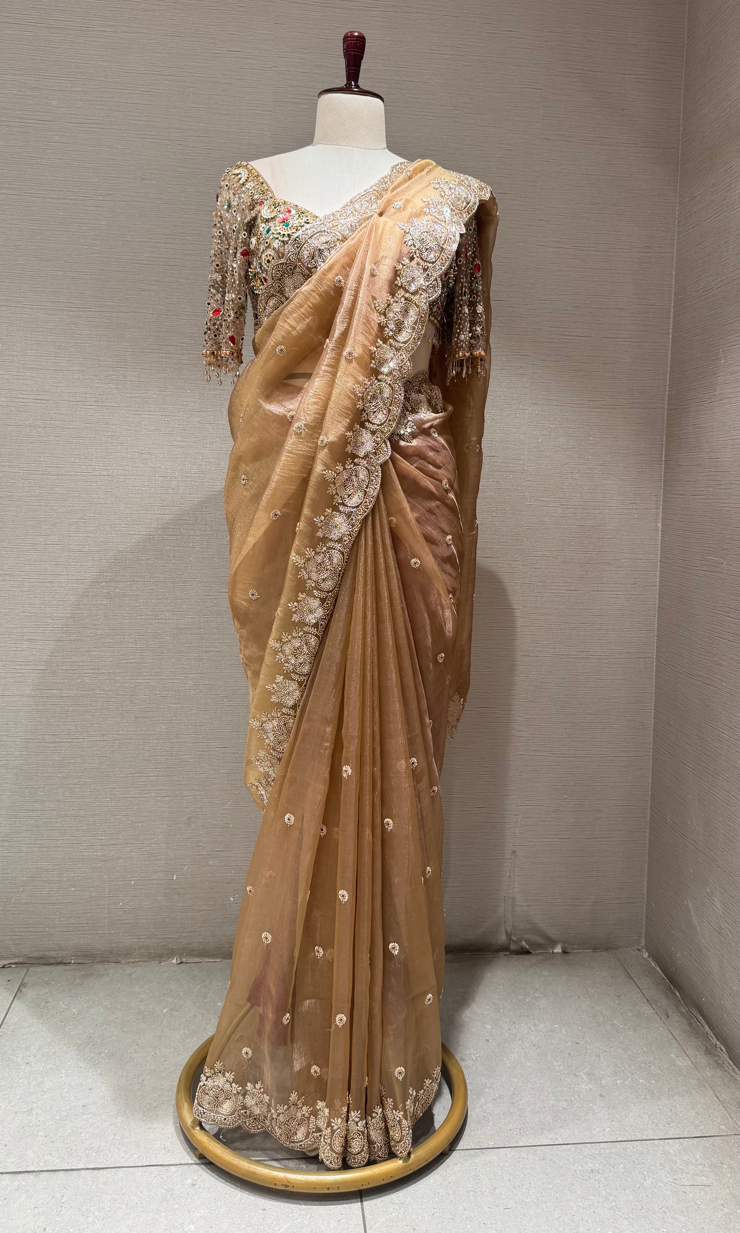 beige net designer saree with embroidered blouse