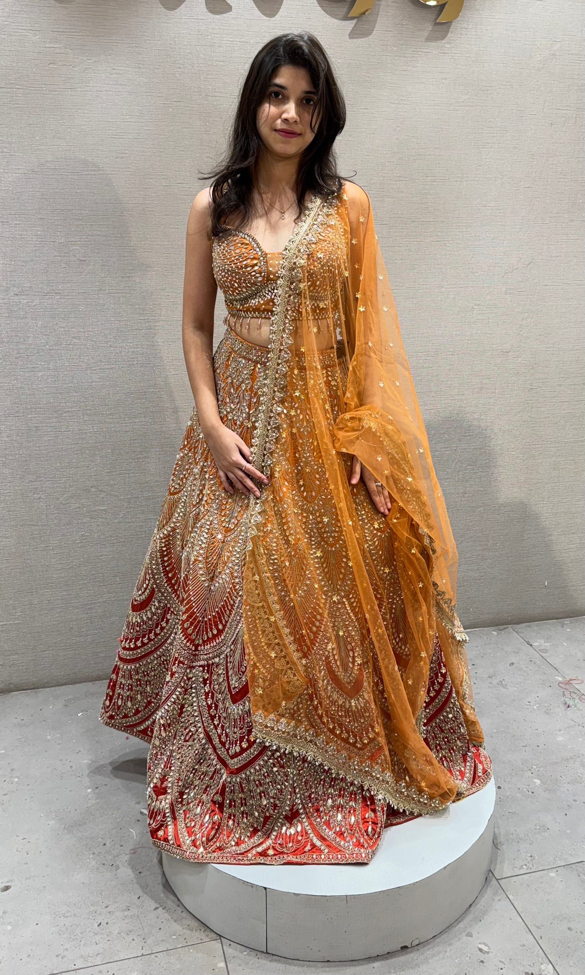 Ornate Rust and Gold Silk Lehenga Choli