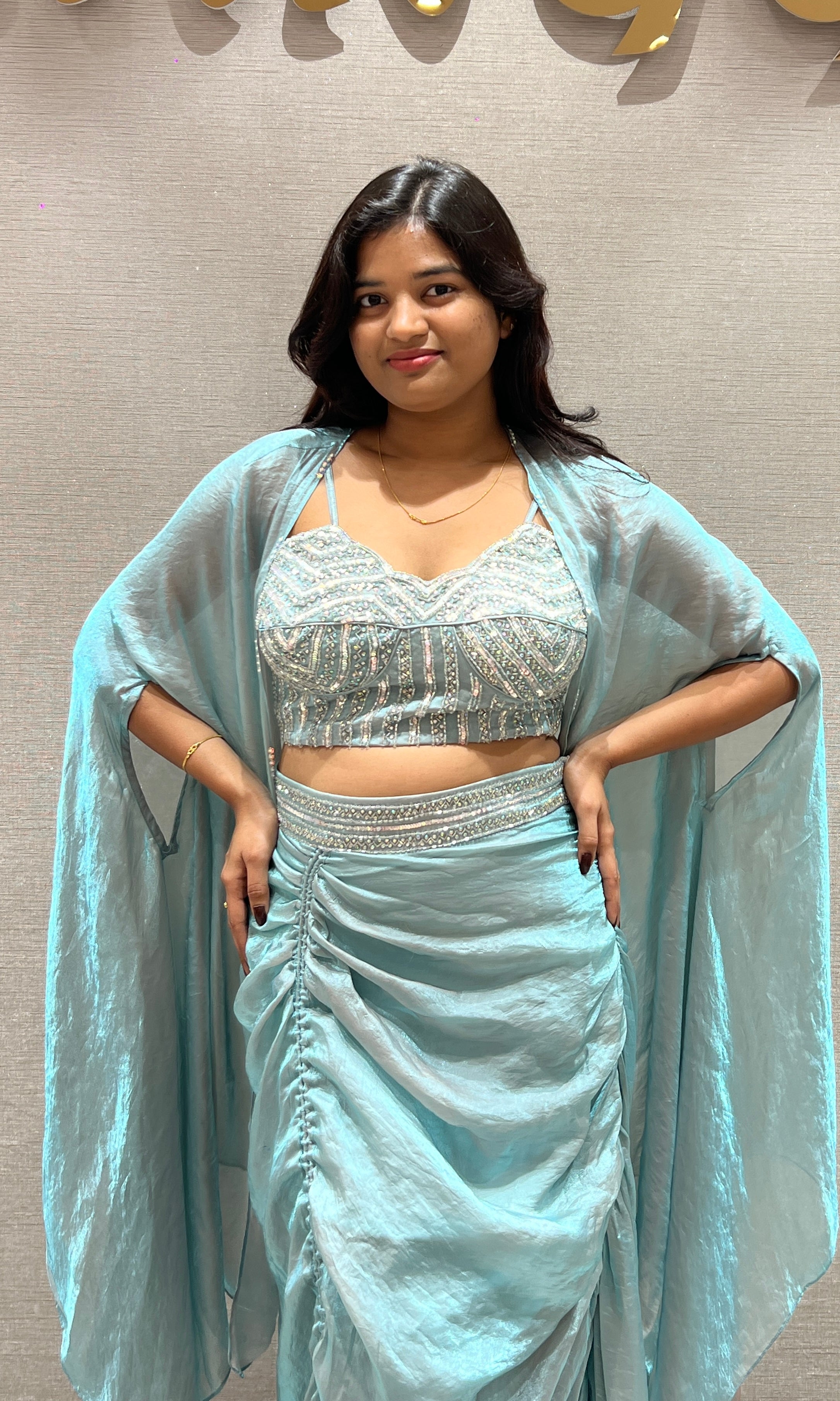 Aqua blue draped saree with Crystal Blouse