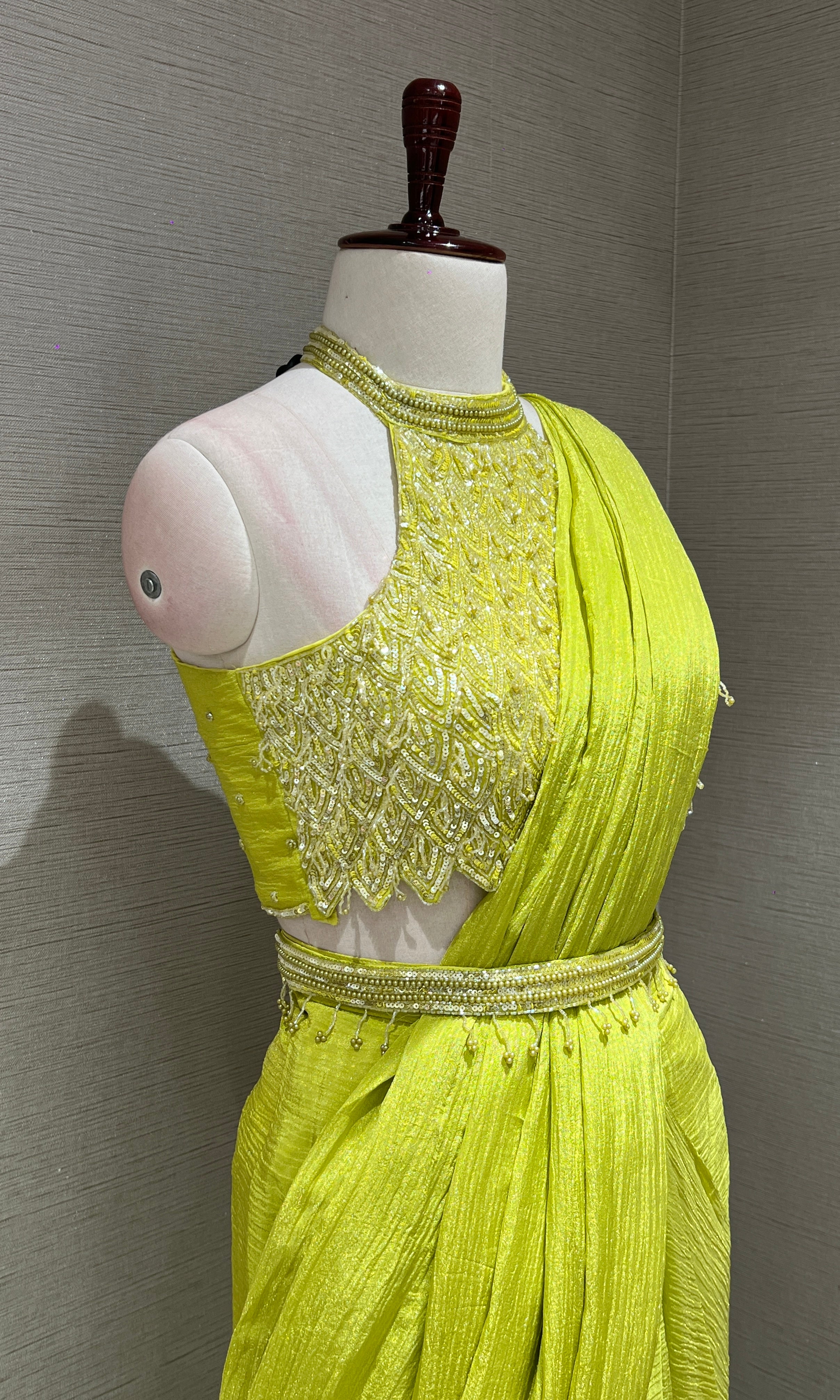 neon green drape saree with halter neck blouse