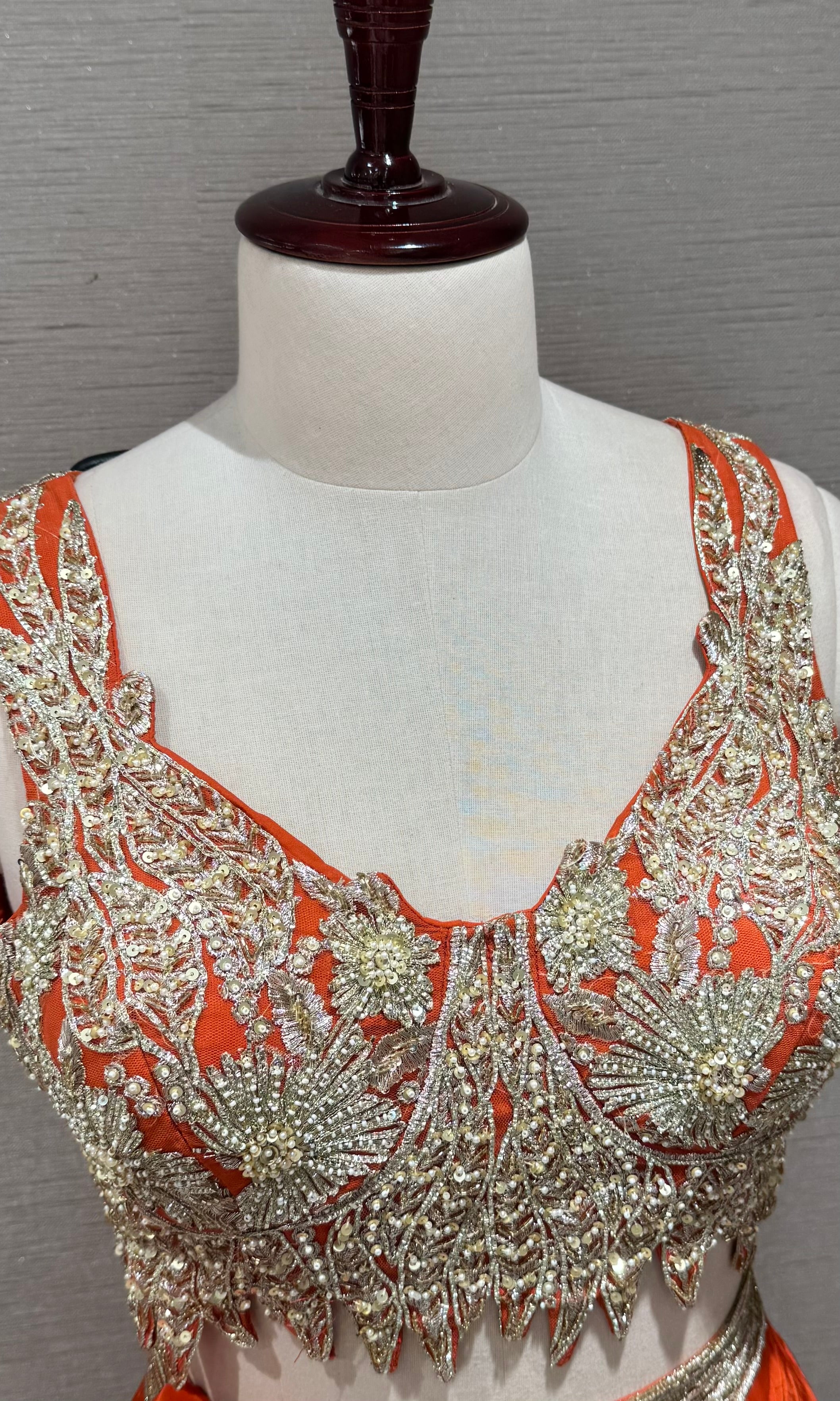 Orange Draped Saree with embroidered blouse & belt