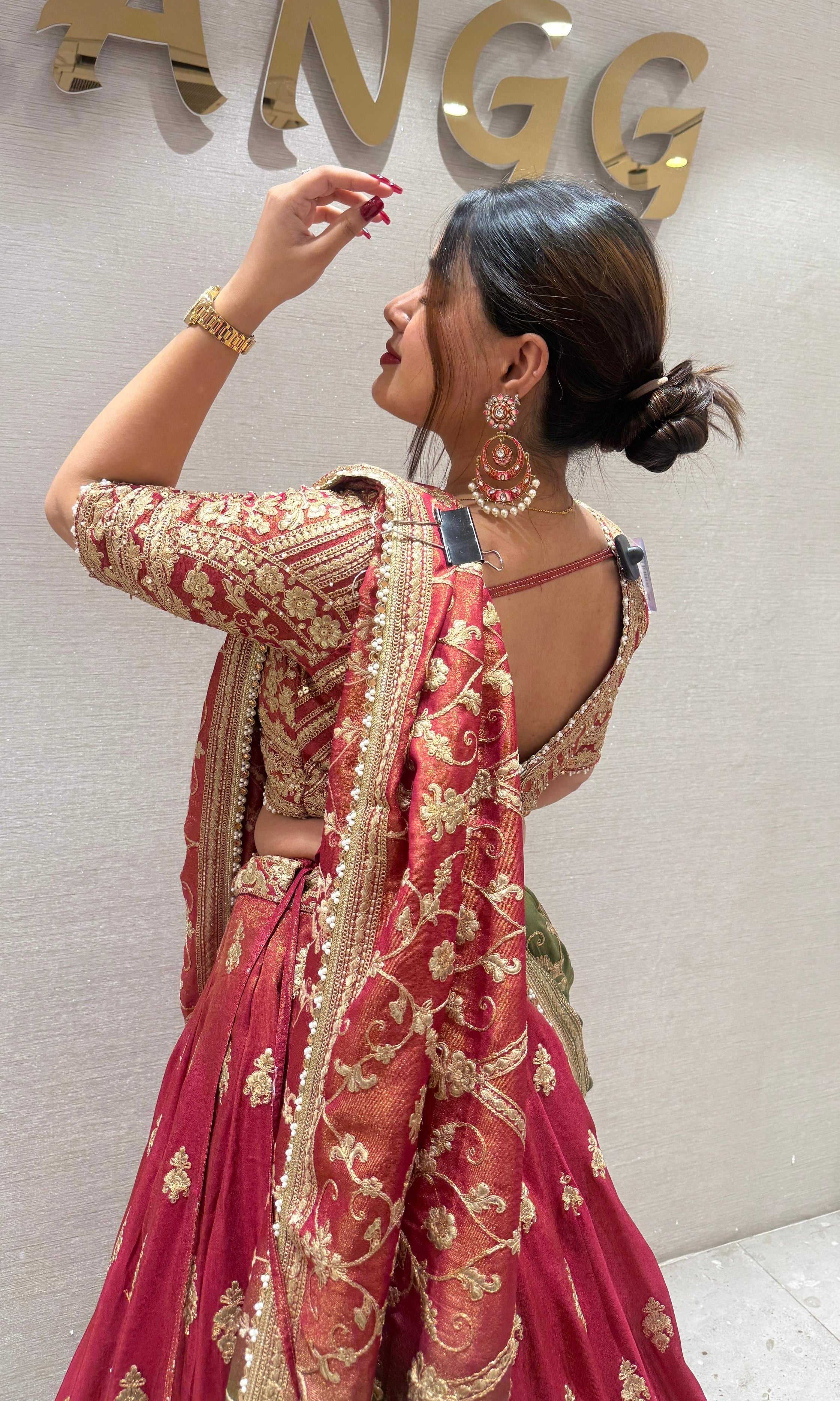 Brick red and green Lehenga with potli