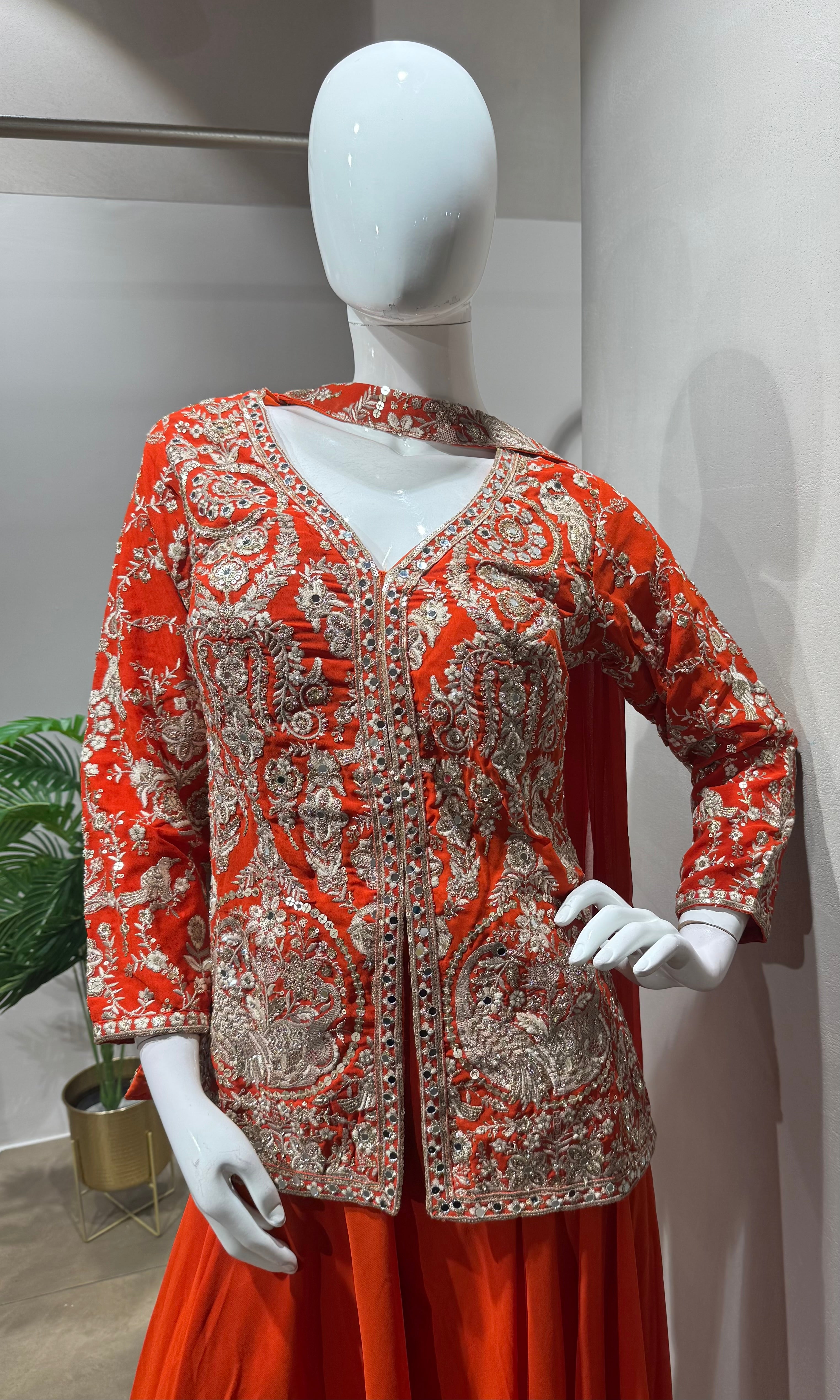 orange and gold embroidered sharara set