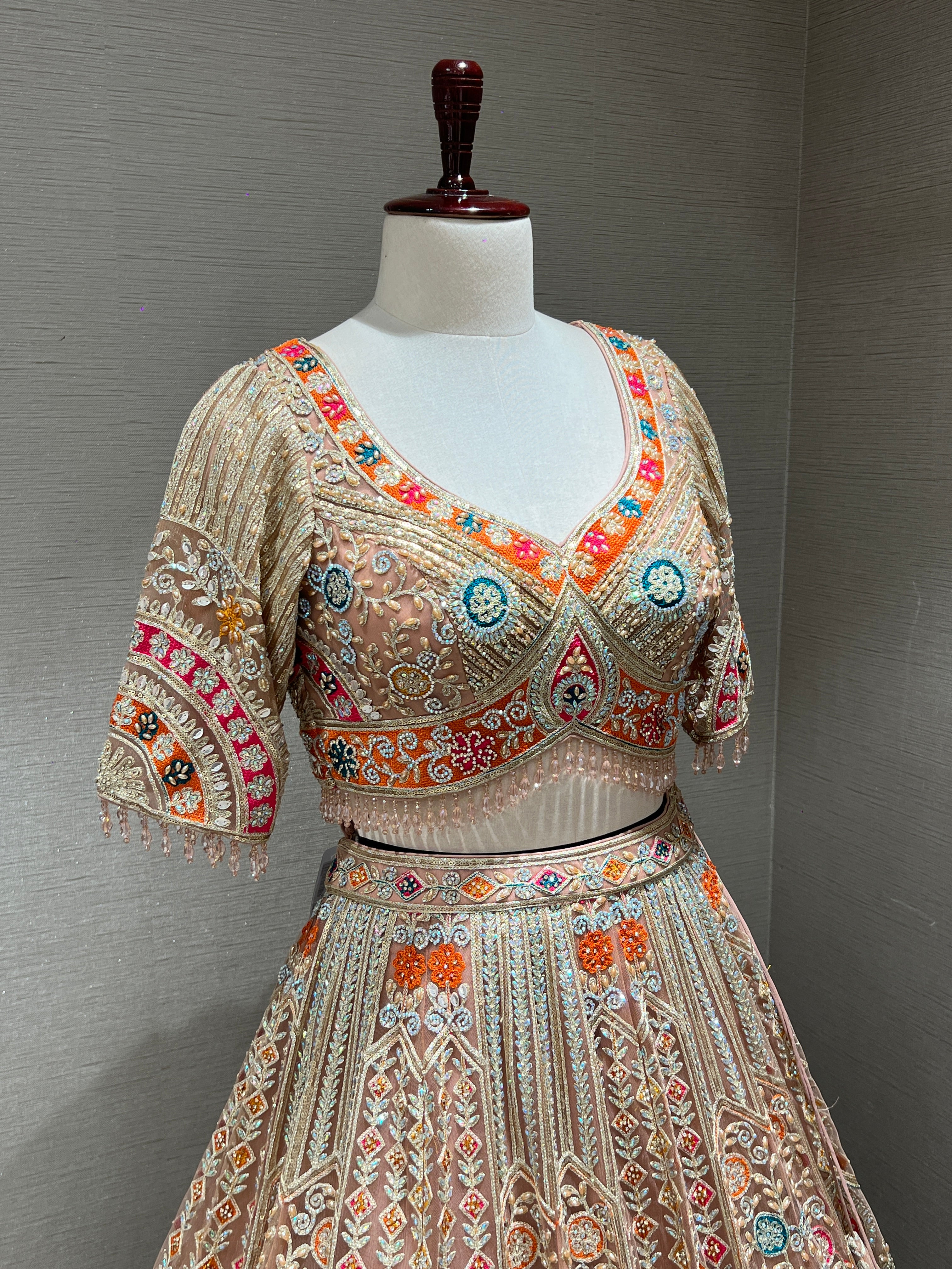 Peach Lehenga with Sequin and stone embellishments