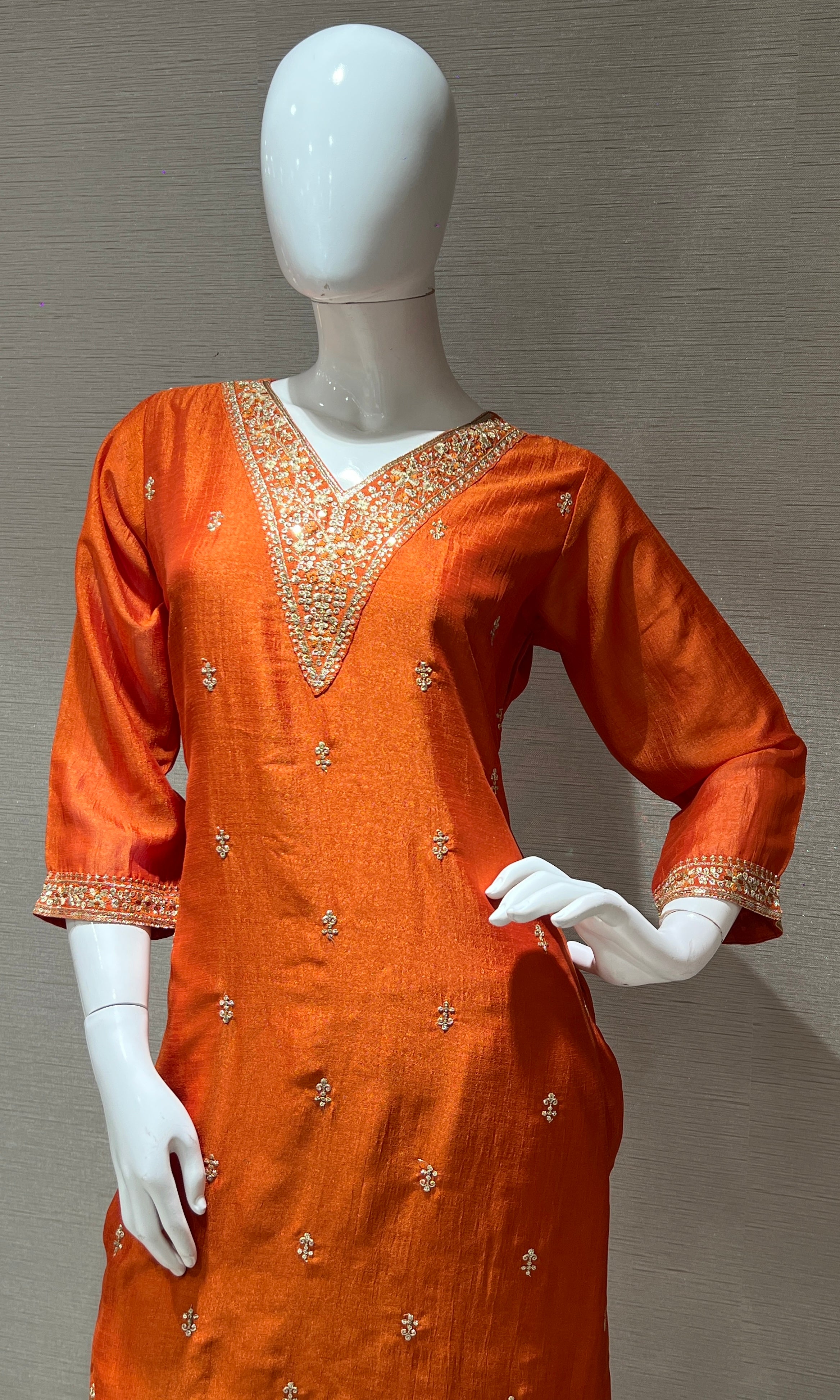 orange kurta set with contrast gold duppatta