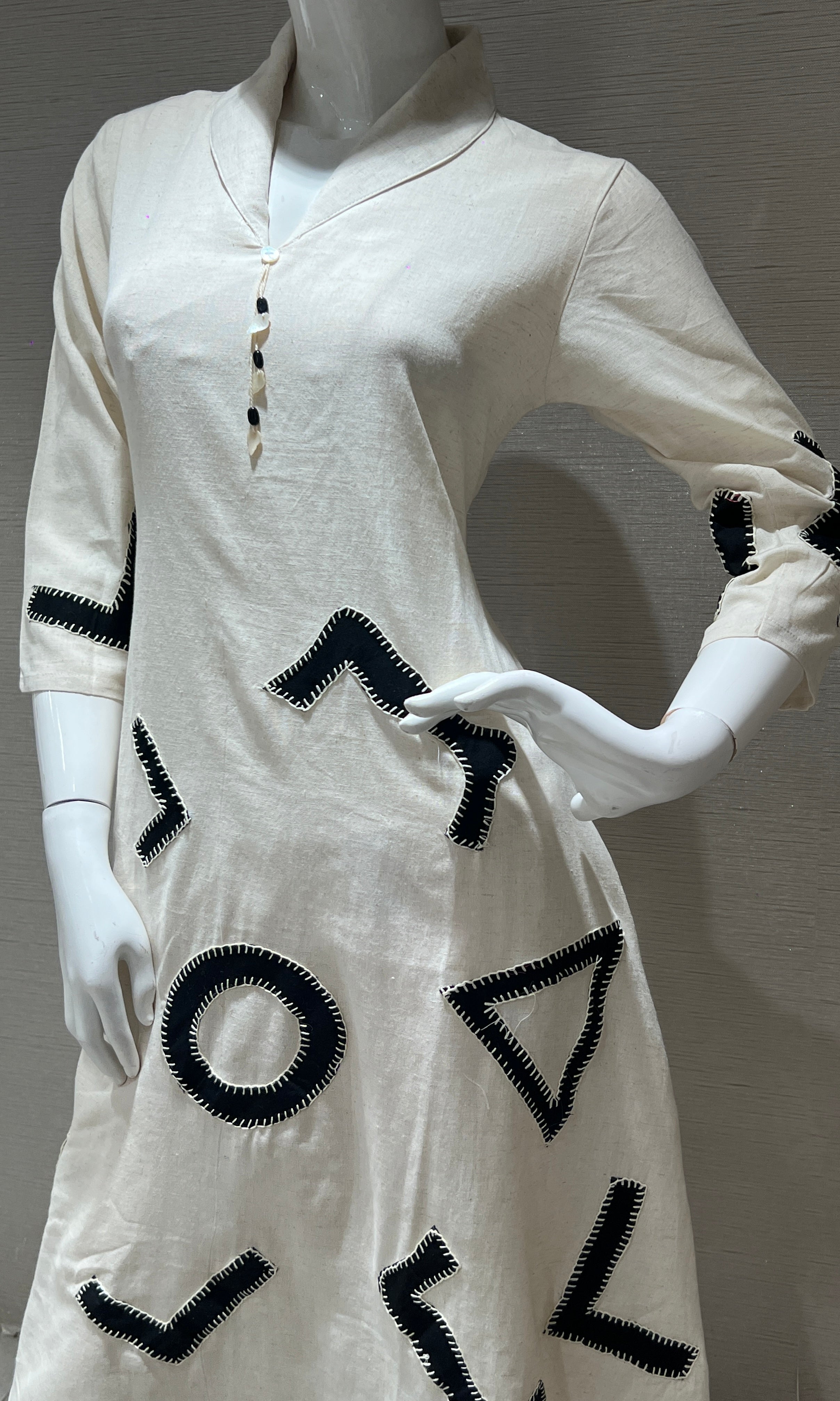 Cream kurta set with a black abstract print