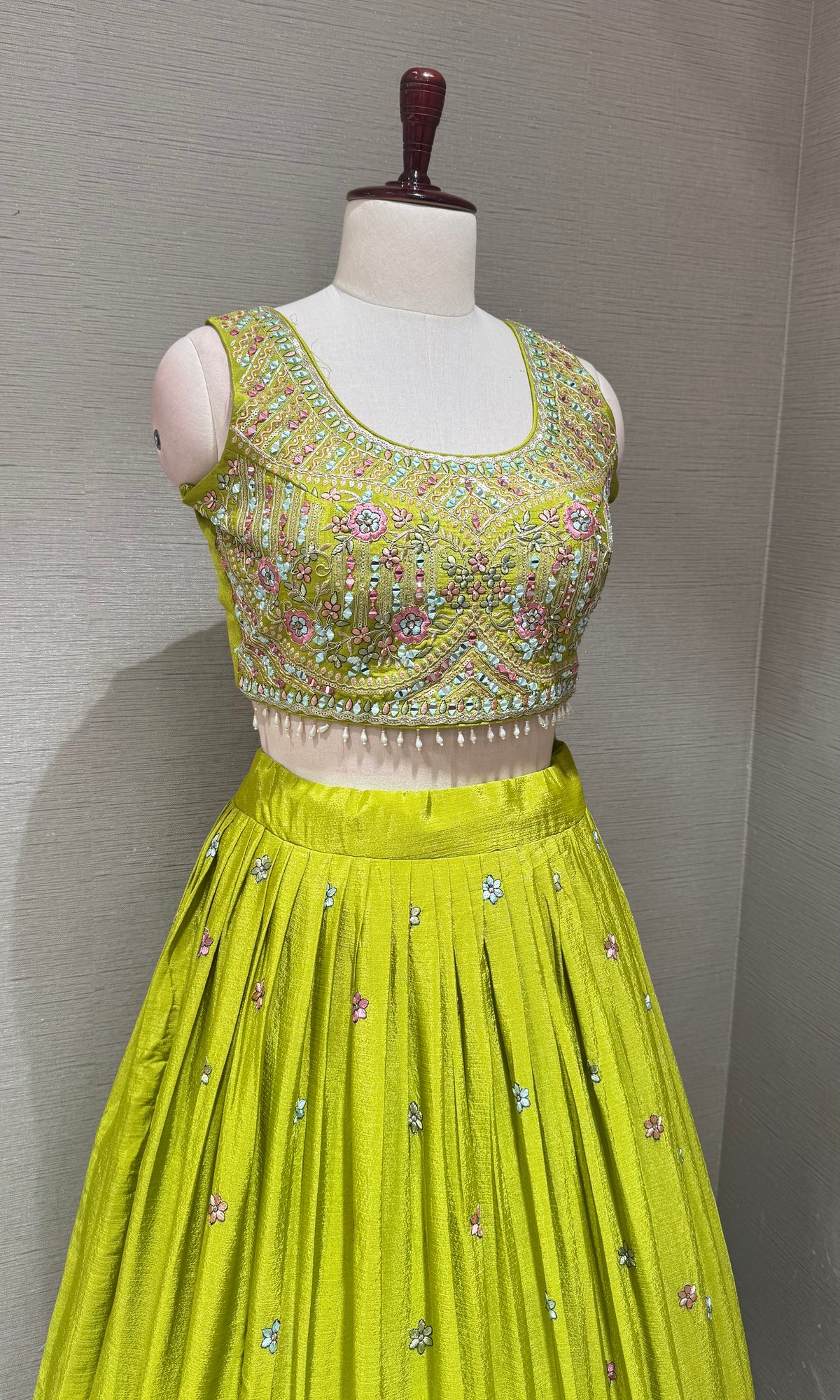 Green Tissue silk lehenga set with intricate floral embroidery