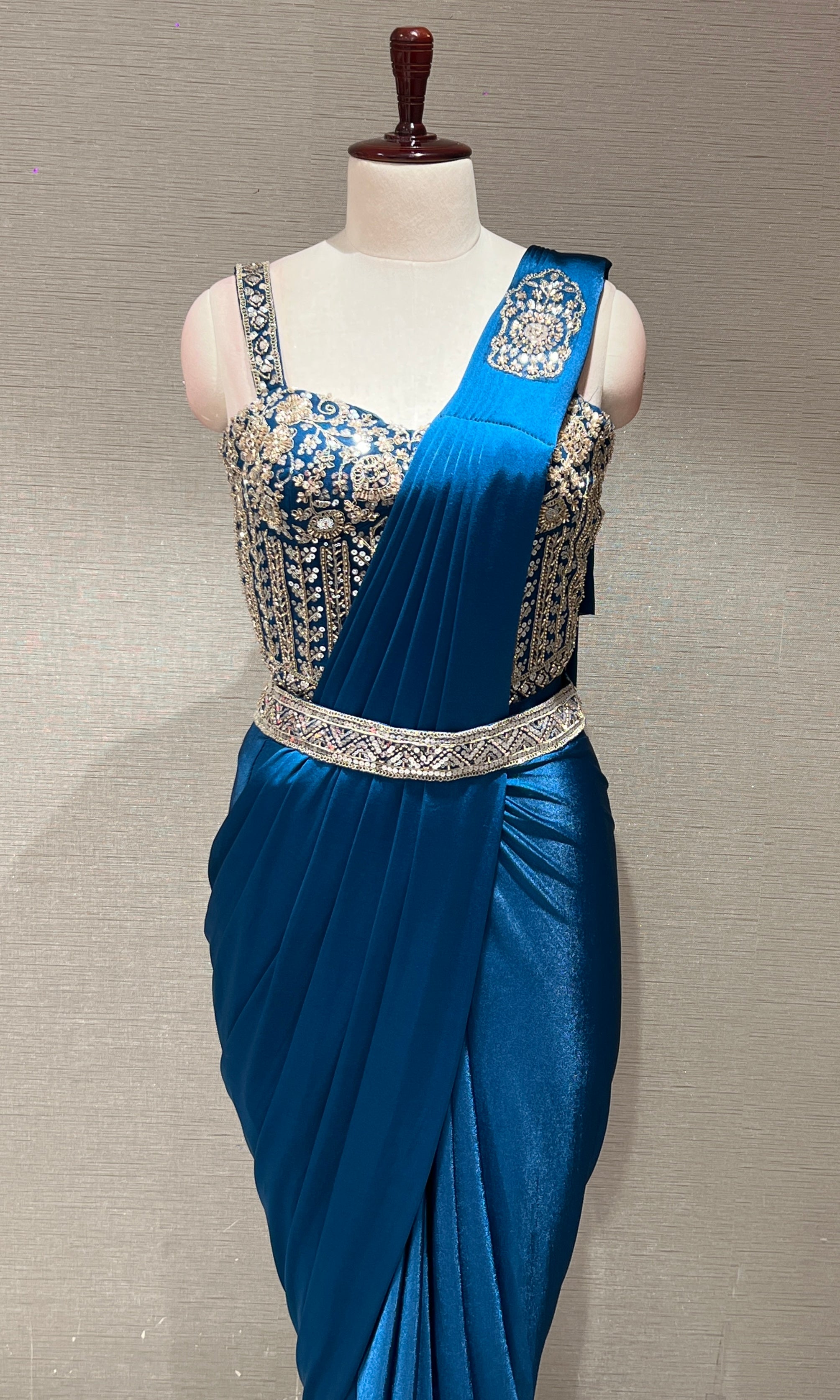 blue drape saree with corset blouse and belt