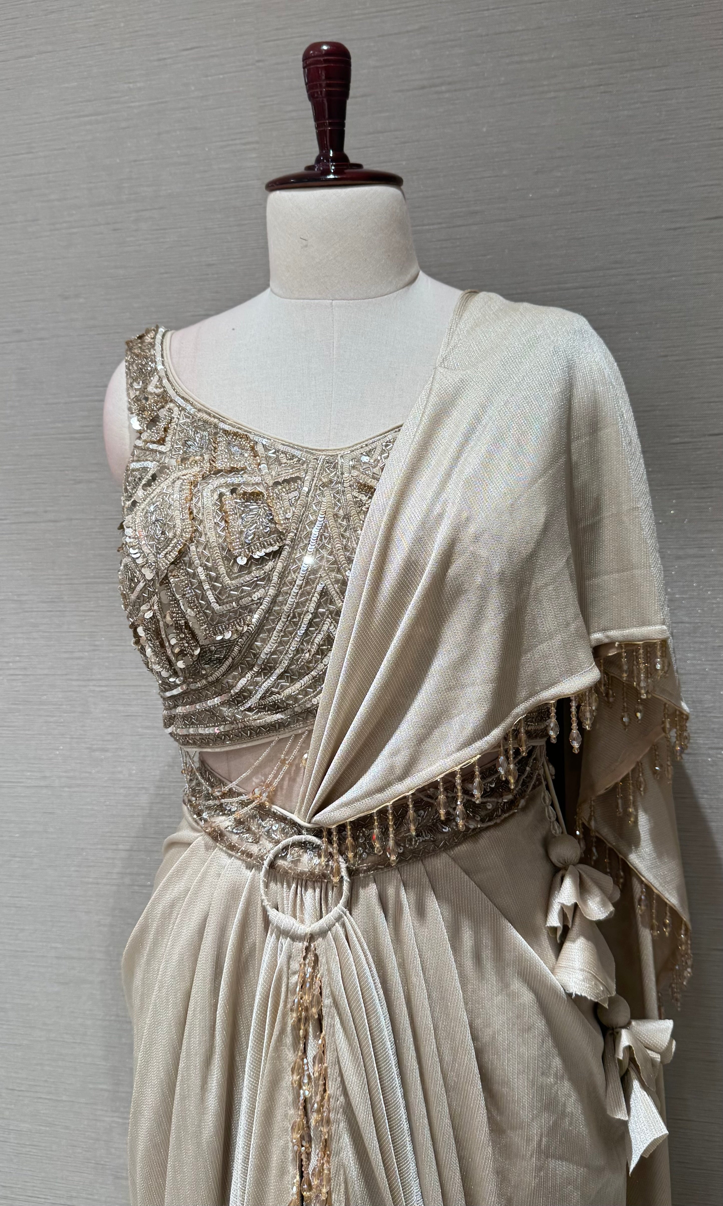 Beige & Gold Draped saree with Embellished Corset