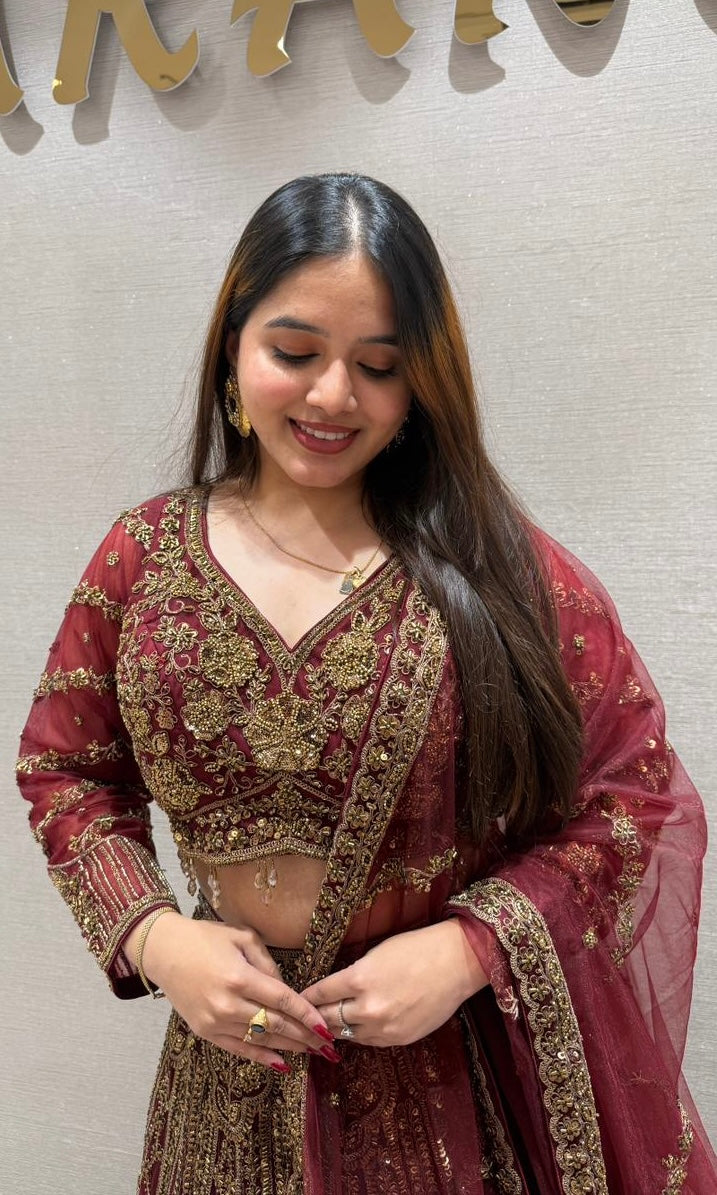 Deep red and gold lehenga