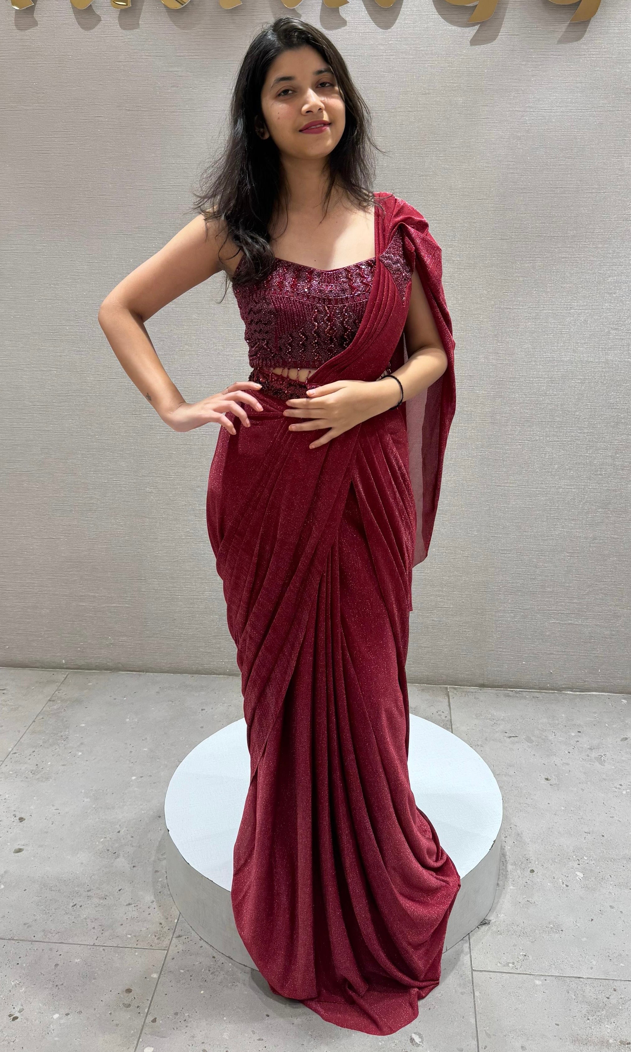 Maroon sequin embroidered drape saree