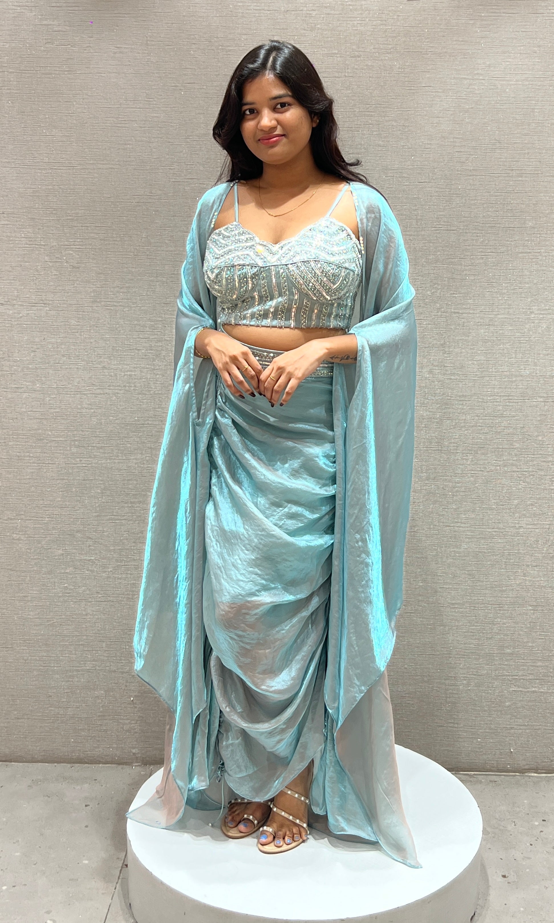 Aqua blue draped saree with Crystal Blouse